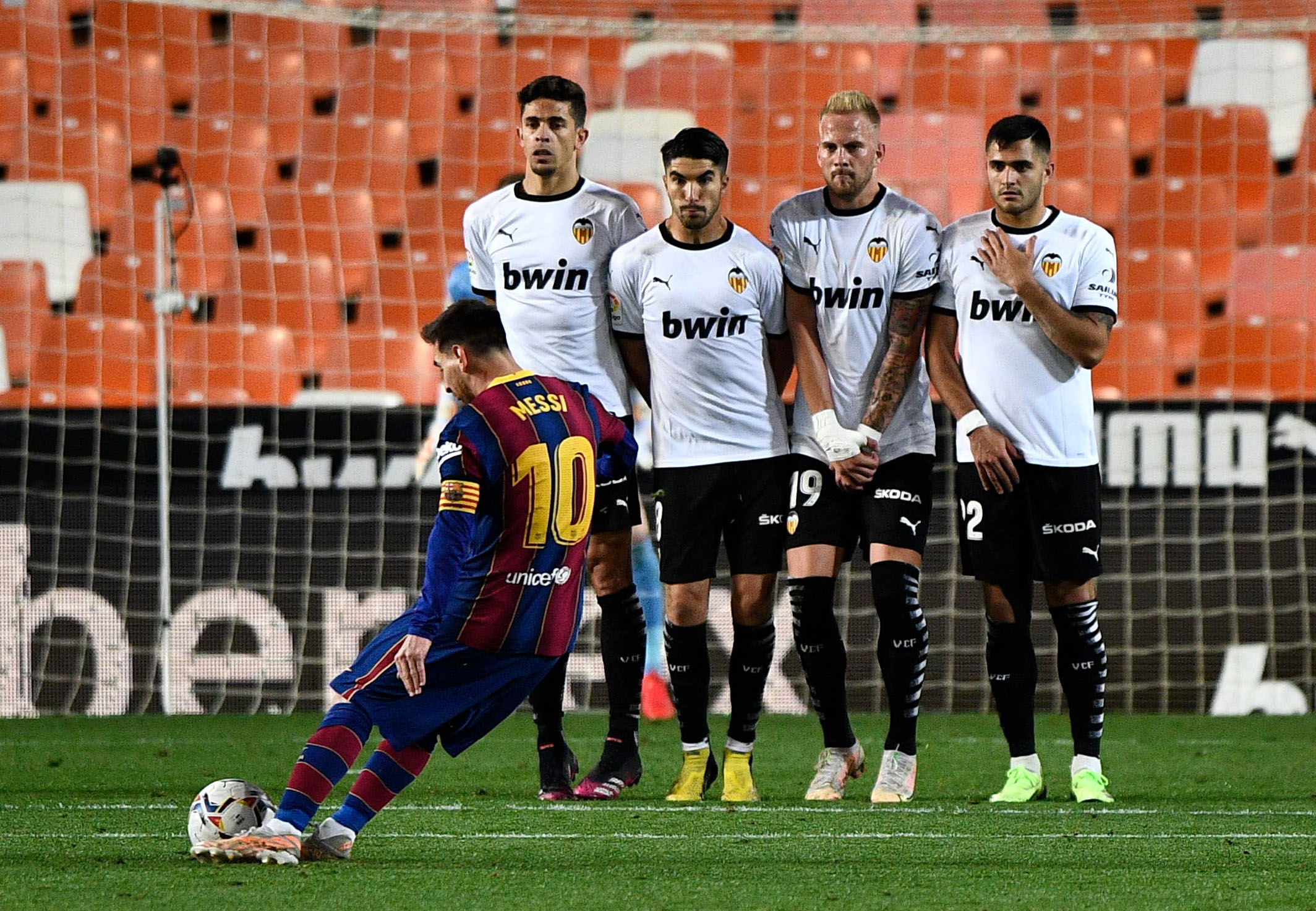 Soccer Football - La Liga Santander - Valencia v FC Barcelona - Mestalla, Valencia, Spain - May 2, 2021 Barcelona's Lionel Messi scores their third goal from a free kick REUTERS