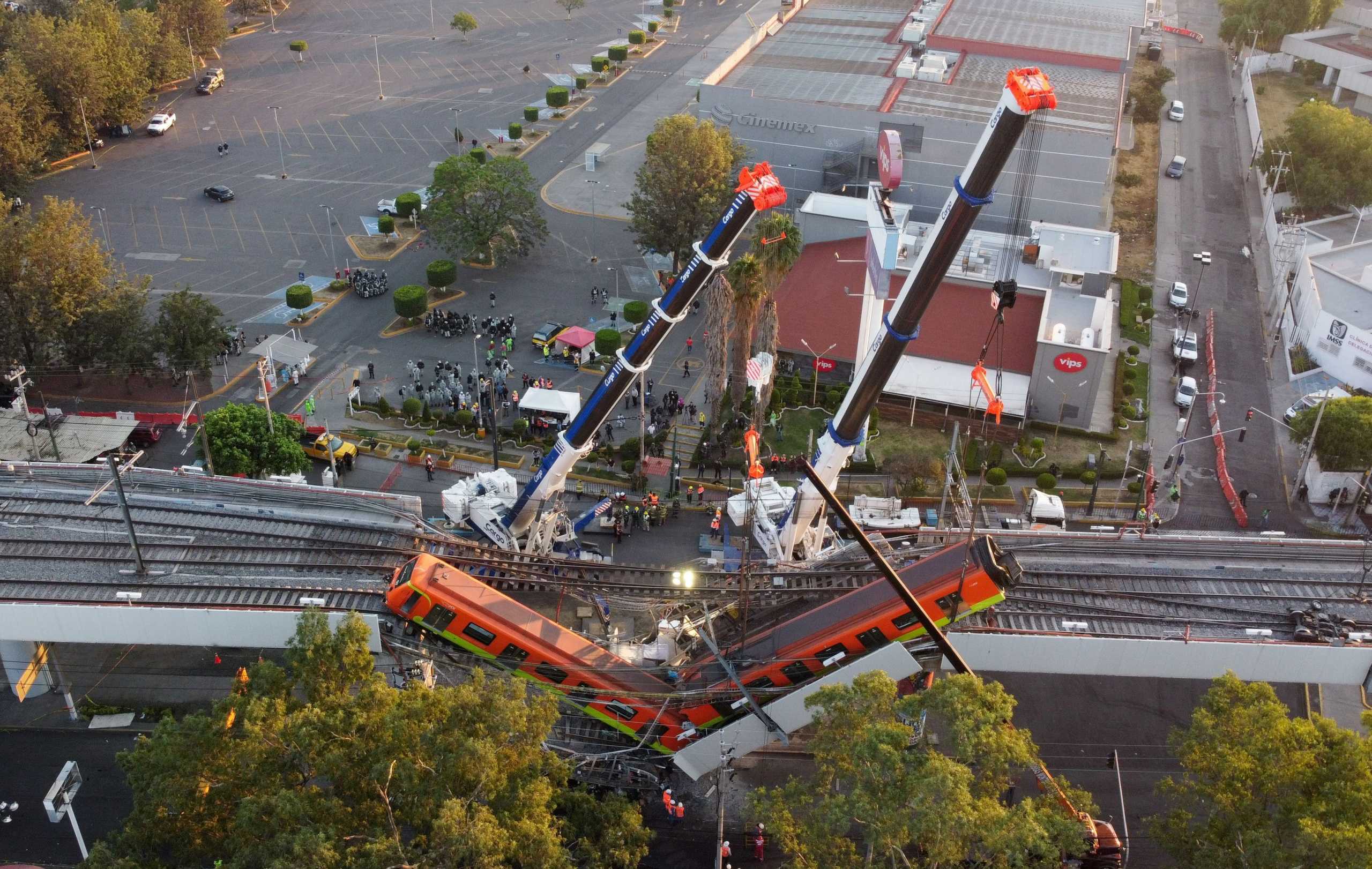 A general view of the damage caused after a railway overpass and train collapsed onto a road in Mexico City, Mexico May 4, 2021. Picture taken with a drone. REUTERS
