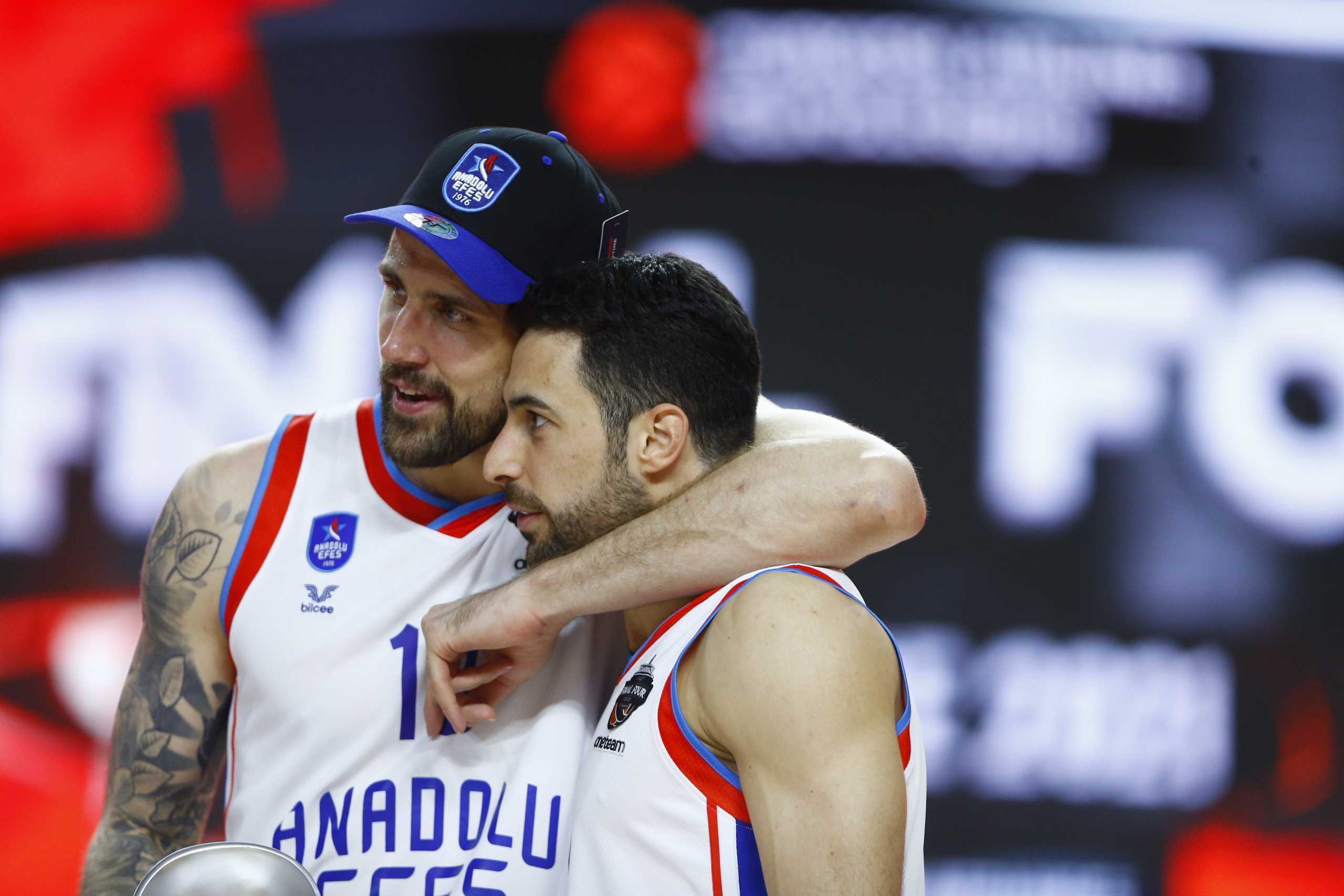 Basketball - Euroleague Final - FC Barcelona v Anadolu Efes Istanbul - Lanxess Arena, Cologne, Germany - May 30, 2021 Anadolu Efes Istanbul's Adrien Moerman and Dogus Balbay celebrate after winning the Euroleague REUTERS