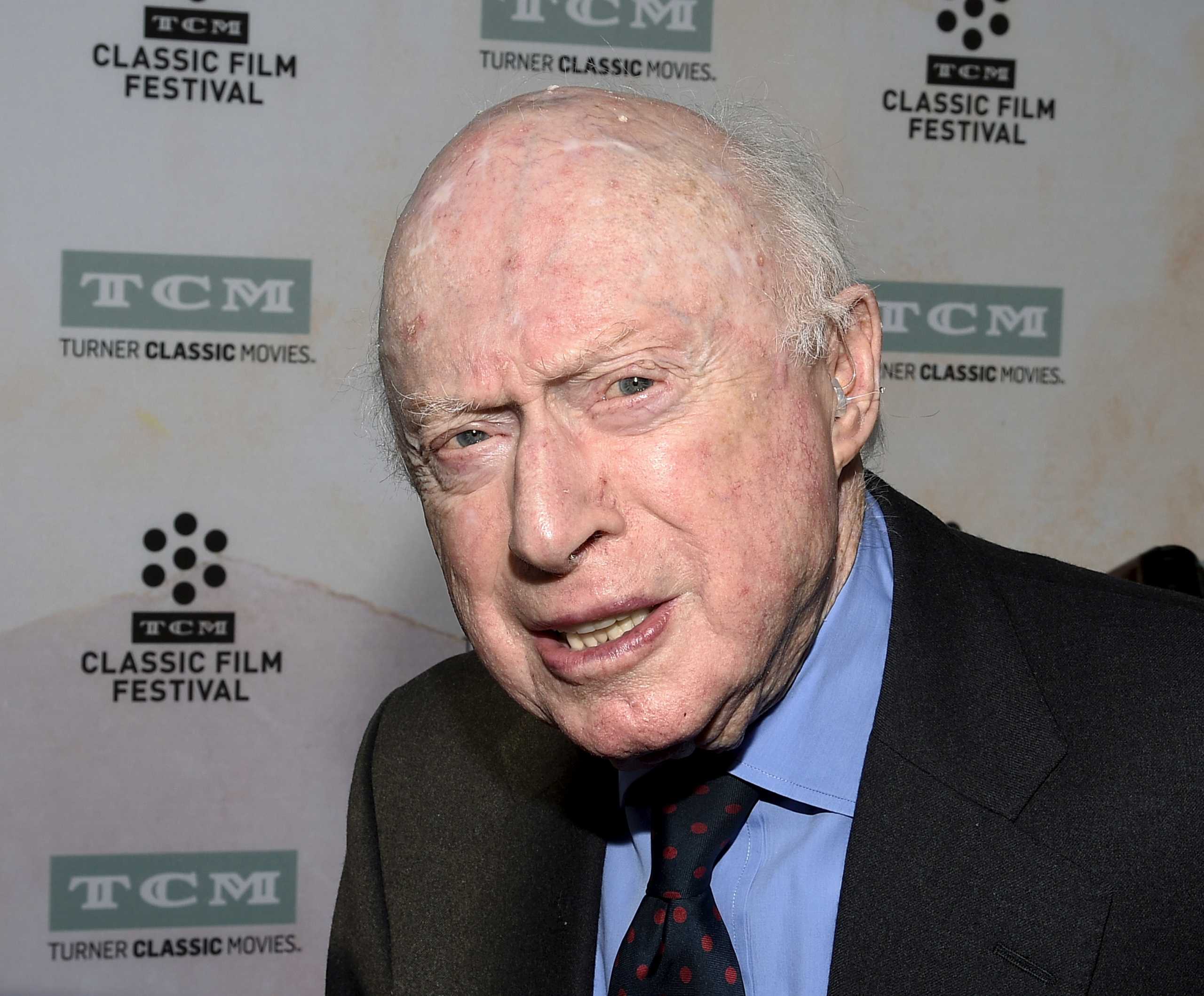 FILE PHOTO: Actor Norman Lloyd poses during 50th anniversary screening of musical drama film "The Sound of Music" at the opening night gala of the 2015 TCM Classic Film Festival in Los Angeles, California March 26, 2015. REUTERS