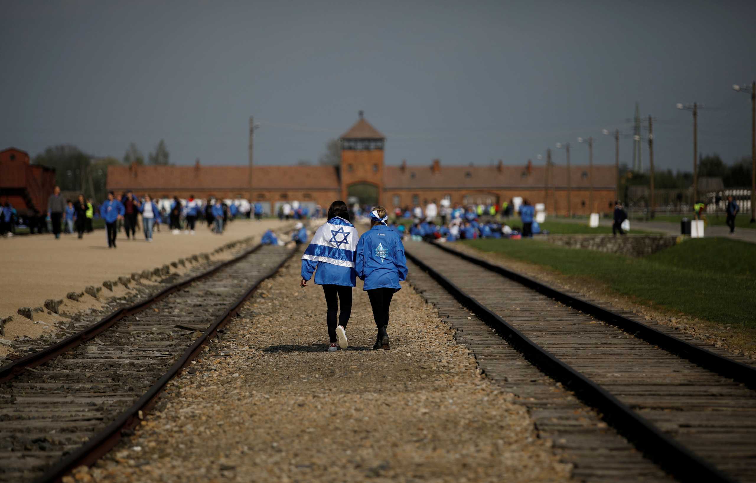 FILE PHOTO: Participants attend the annual "March of the Living" to commemorate the Holocaust at the former Nazi concentration camp Auschwitz, in Brzezinka near Oswiecim, Poland, May 2, 2019. REUTERS