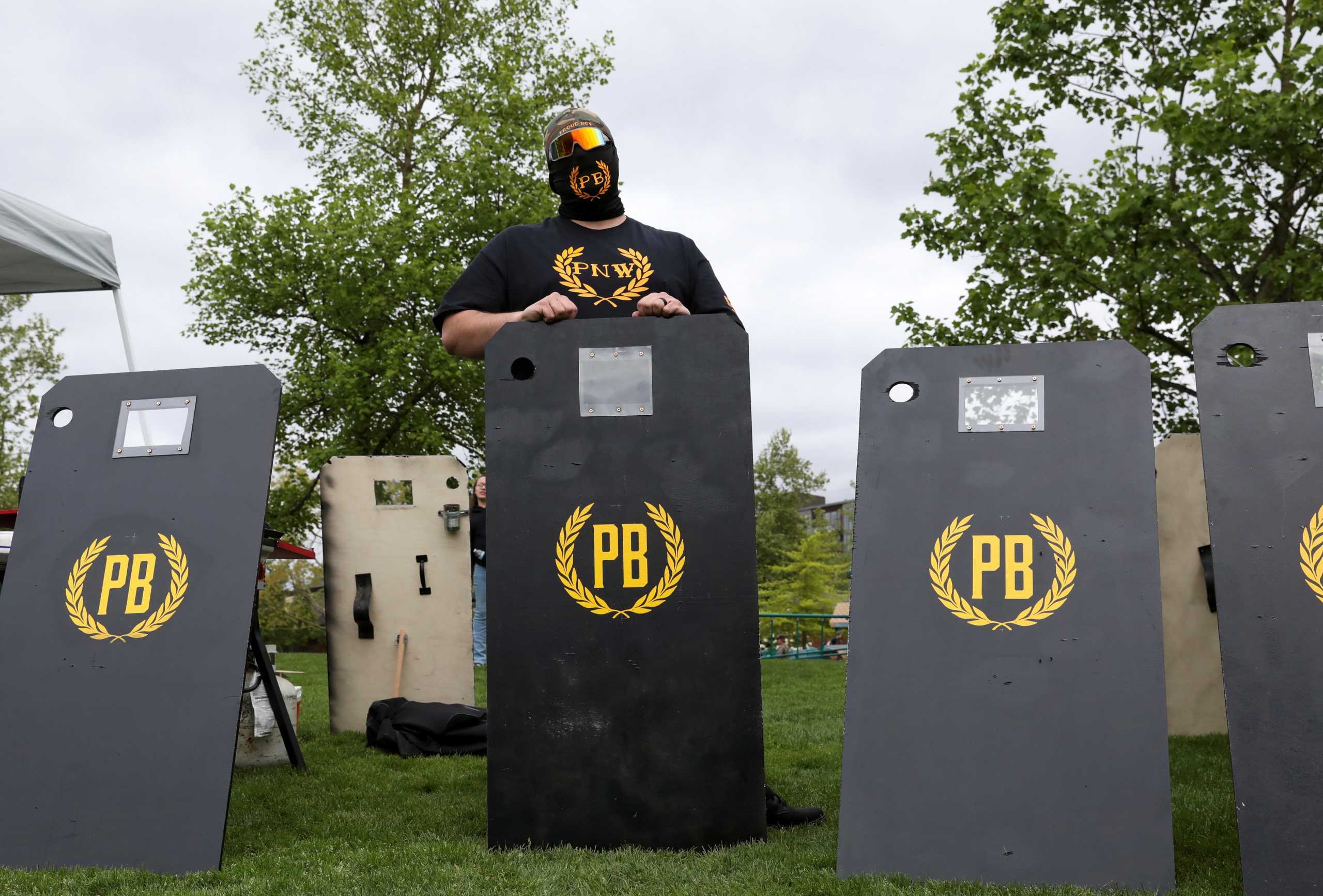 A members of Proud Boys listens to speeches during a May Day Second Amendment rally at Riverfront Park in Salem, Oregon, U.S., May 1, 2021. REUTERS