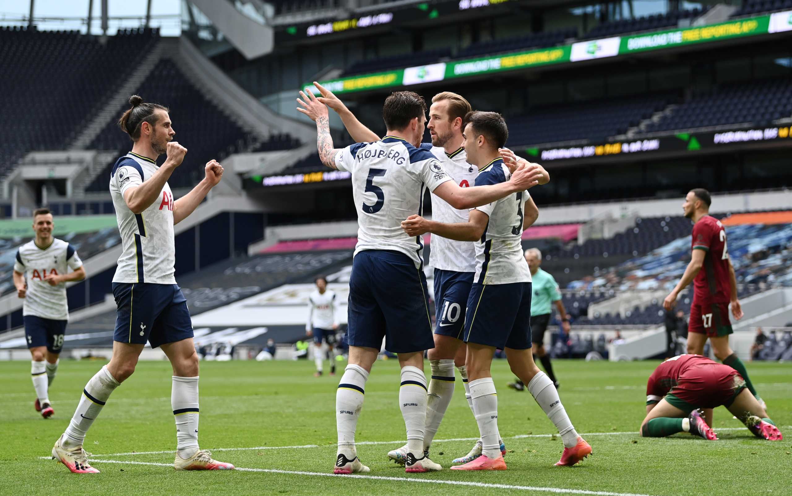 Soccer Football - Premier League - Tottenham Hotspur v Wolverhampton Wanderers - Tottenham Hotspur Stadium, London, Britain - May 16, 2021 Tottenham Hotspur's Pierre-Emile Hojbjerg celebrates scoring their second with Sergio Reguilon and Harry Kane Pool via REUTERS