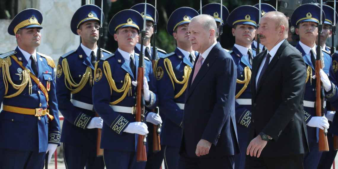 Turkey's President Tayyip Erdogan and Azerbaijan's President Ilham Aliyev review a guard of honour during a welcoming ceremony in Shusha in Nagorno-Karabakh region, Azerbaijan June 15, 2021. Presidential Press Office