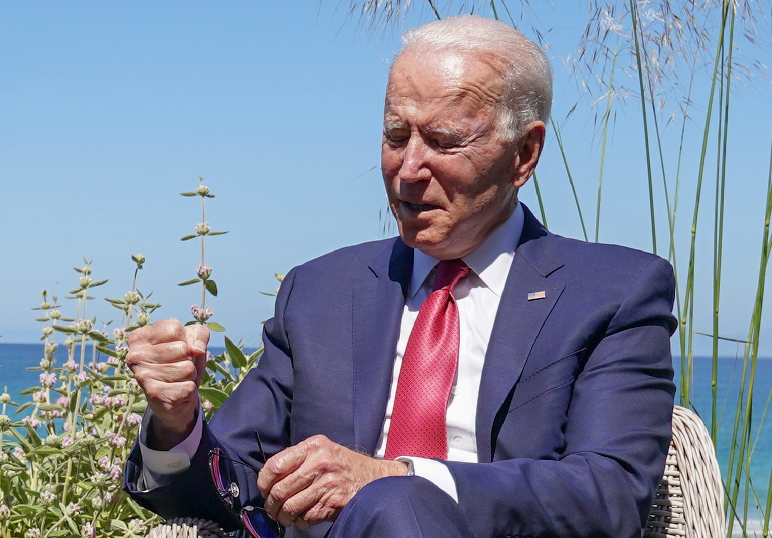 U.S. President Joe Biden reacts during a bilateral meeting with France's President Emmanuel Macron during the G7 summit in Carbis Bay, Cornwall, Britain, June 12, 2021. REUTERS