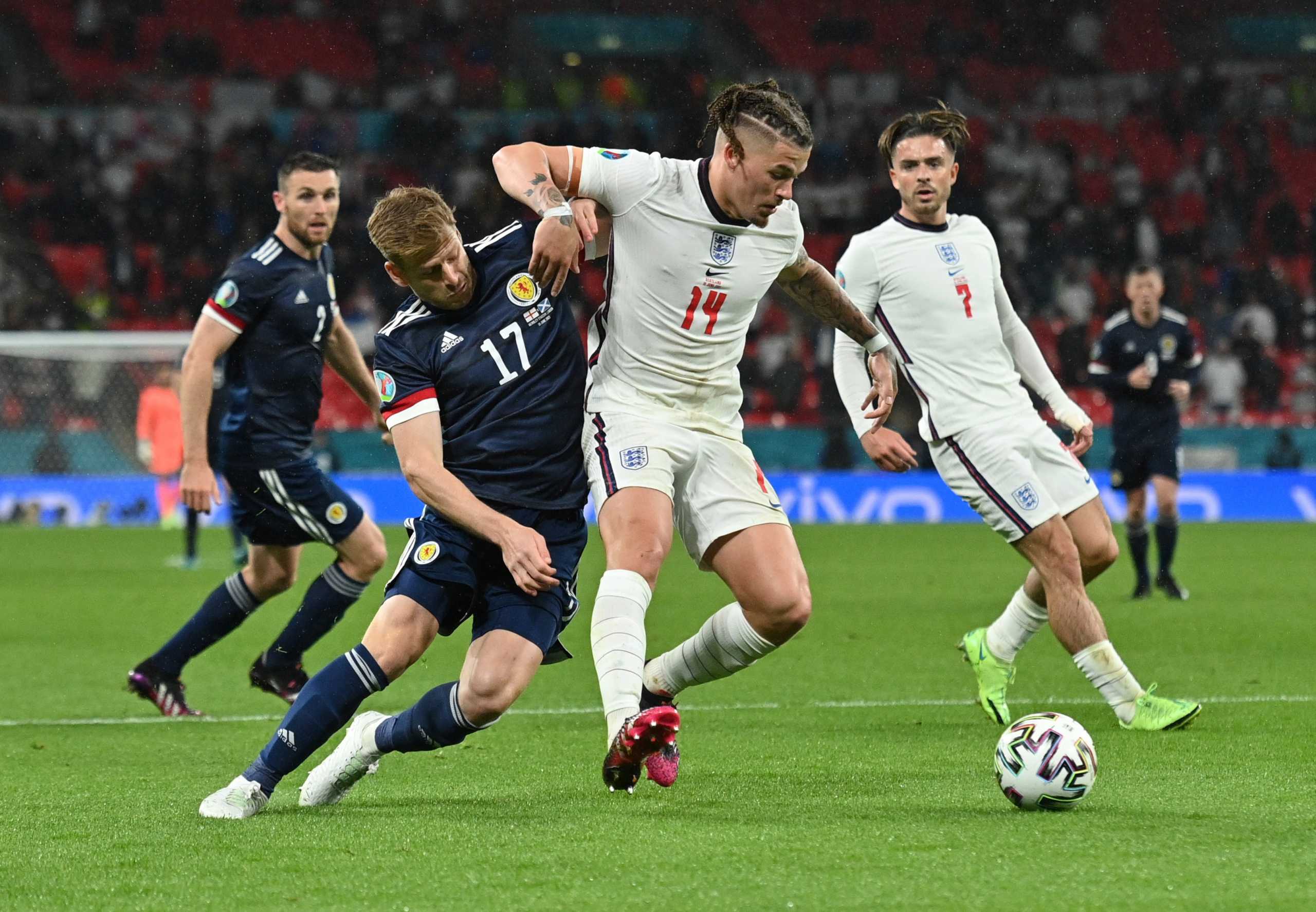 Soccer Football - Euro 2020 - Group D - England v Scotland - Wembley Stadium, London, Britain - June 18, 2021 England's Kalvin Phillips in action with Scotland's Stuart Armstrong Pool via REUTERS