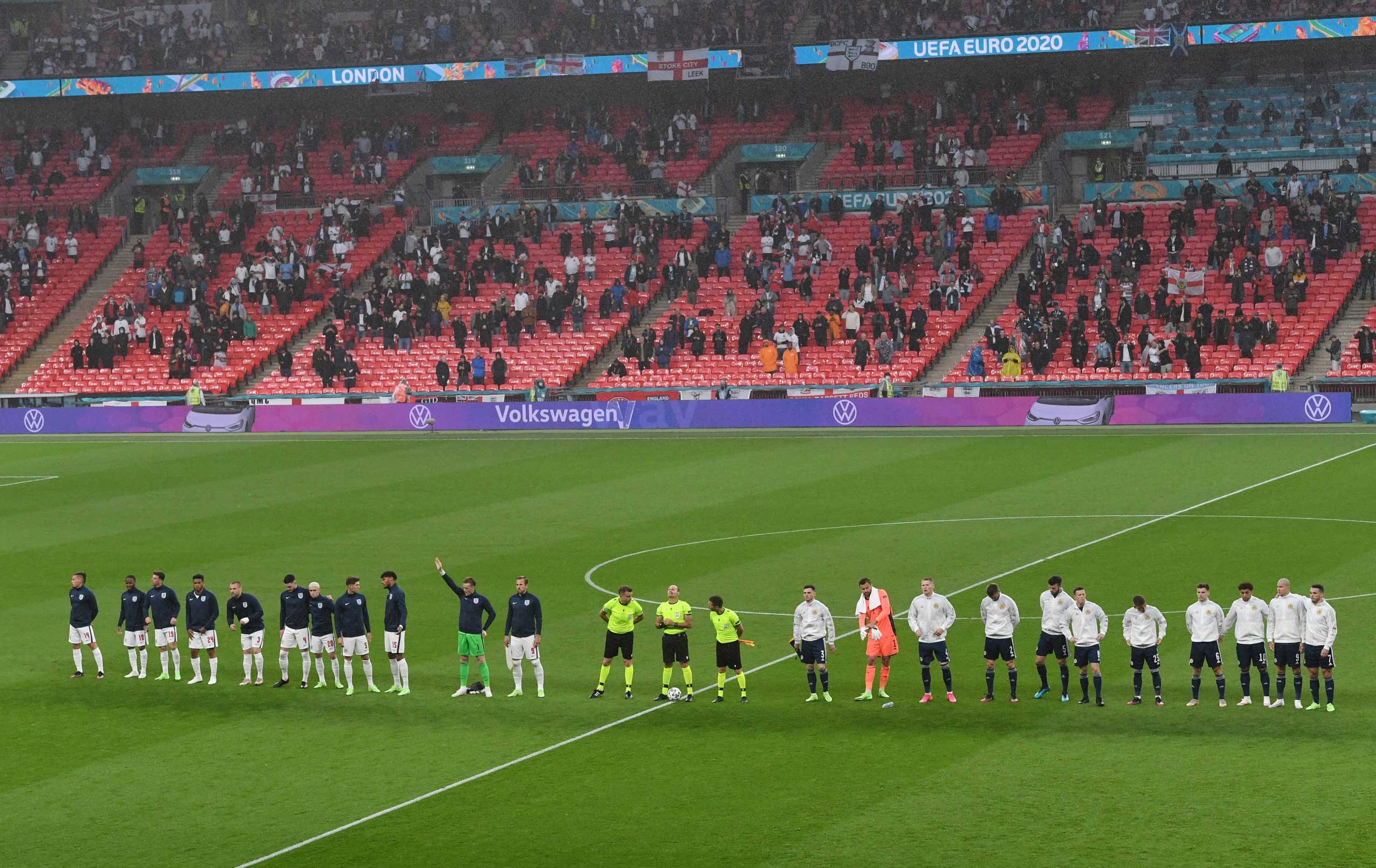 Soccer Football - Euro 2020 - Group D - England v Scotland - Wembley Stadium, London, Britain - June 18, 2021 Players line up before the match Pool via REUTERS