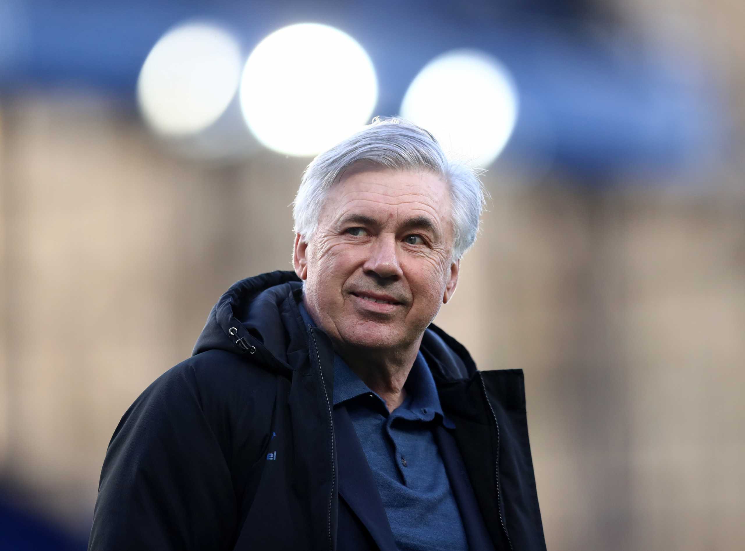 Soccer Football - Premier League - Everton v Wolverhampton Wanderers - Goodison Park, Liverpool, Britain - May 19, 2021 Everton manager Carlo Ancelotti during a lap of appreciation after the match, as a limited number of fans are permitted at outdoor sports venues Pool via REUTERS