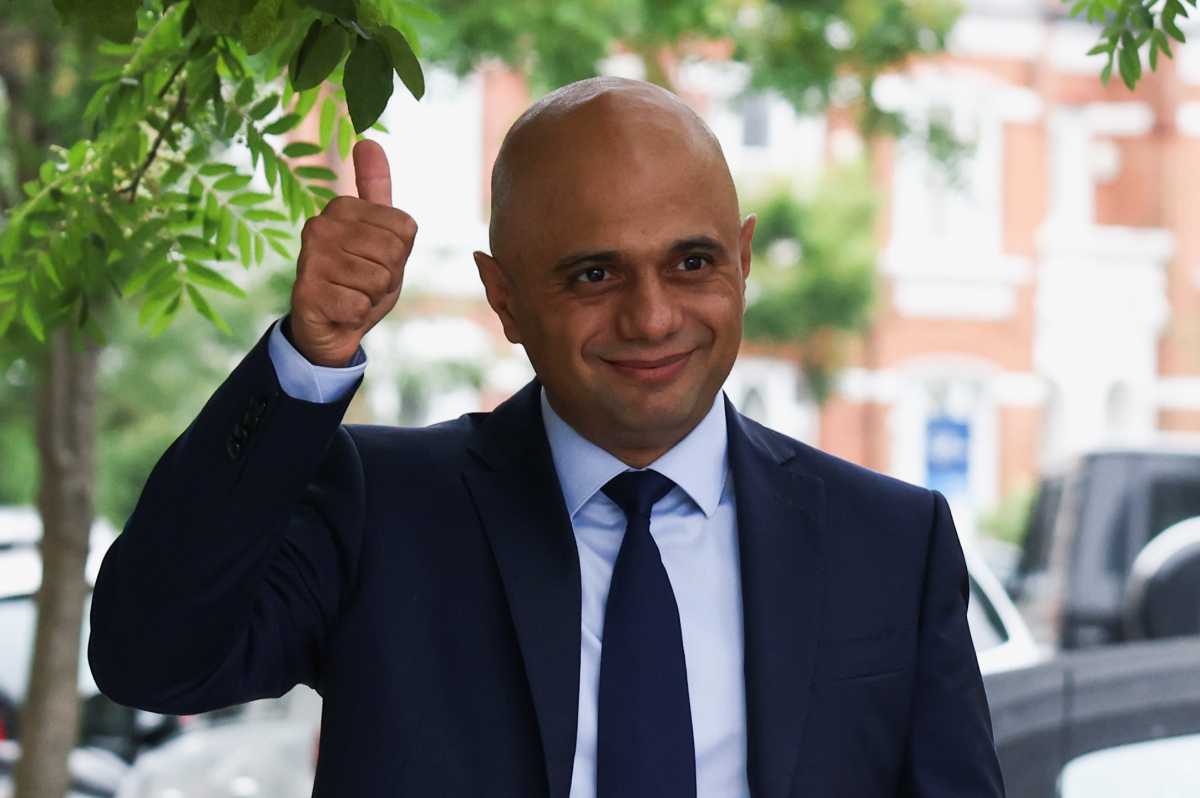 Britain's new Health Secretary Sajid Javid gestures, as he leaves his home in London, Britain June 27, 2021. REUTERS