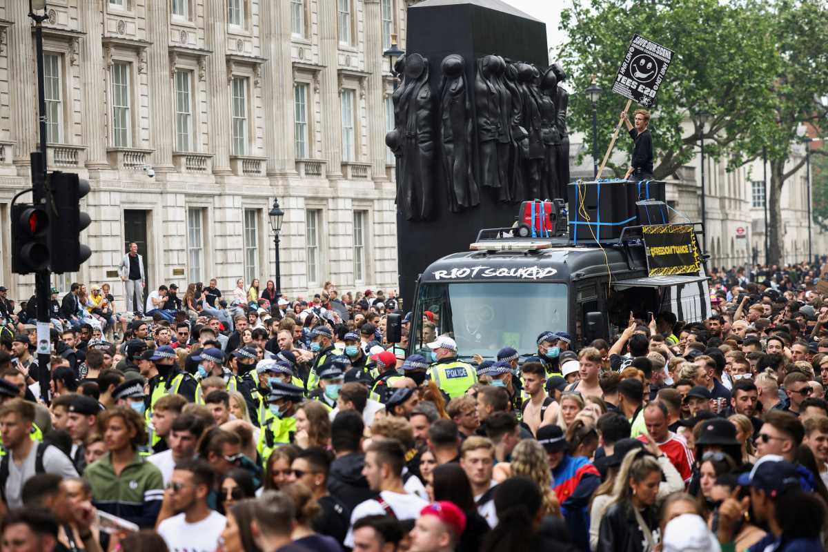 Demonstrators calling for nightclubs to reopen gather around a sound system truck during the Save Our Scene protest, amid the coronavirus disease (COVID-19) pandemic, in London, Britain June 27, 2021. REUTERS