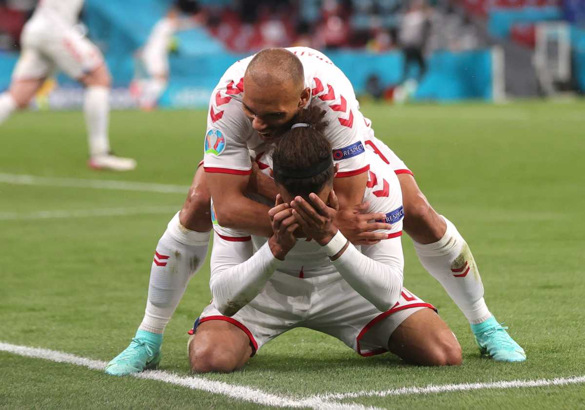 Soccer Football - Euro 2020 - Group B - Russia v Denmark - Parken Stadium, Copenhagen, Denmark - June 21, 2021  Denmark's Yussuf Poulsen celebrates scoring their second goal with teammate Martin Braithwaite  Pool via REUTERS