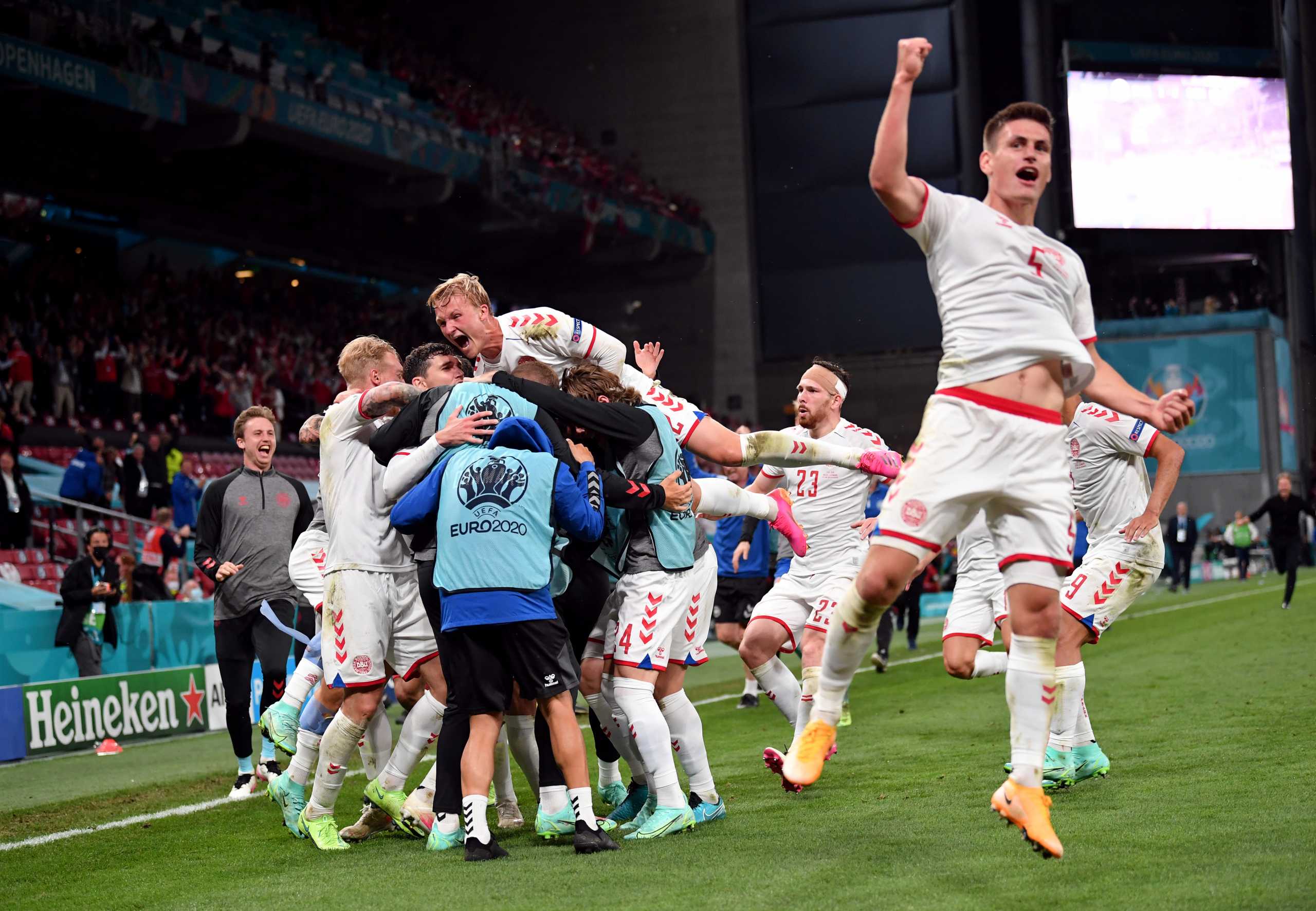 Soccer Football - Euro 2020 - Group B - Russia v Denmark - Parken Stadium, Copenhagen, Denmark - June 21, 2021 Denmark' players celebrate after scoring their third goal Pool via REUTERS