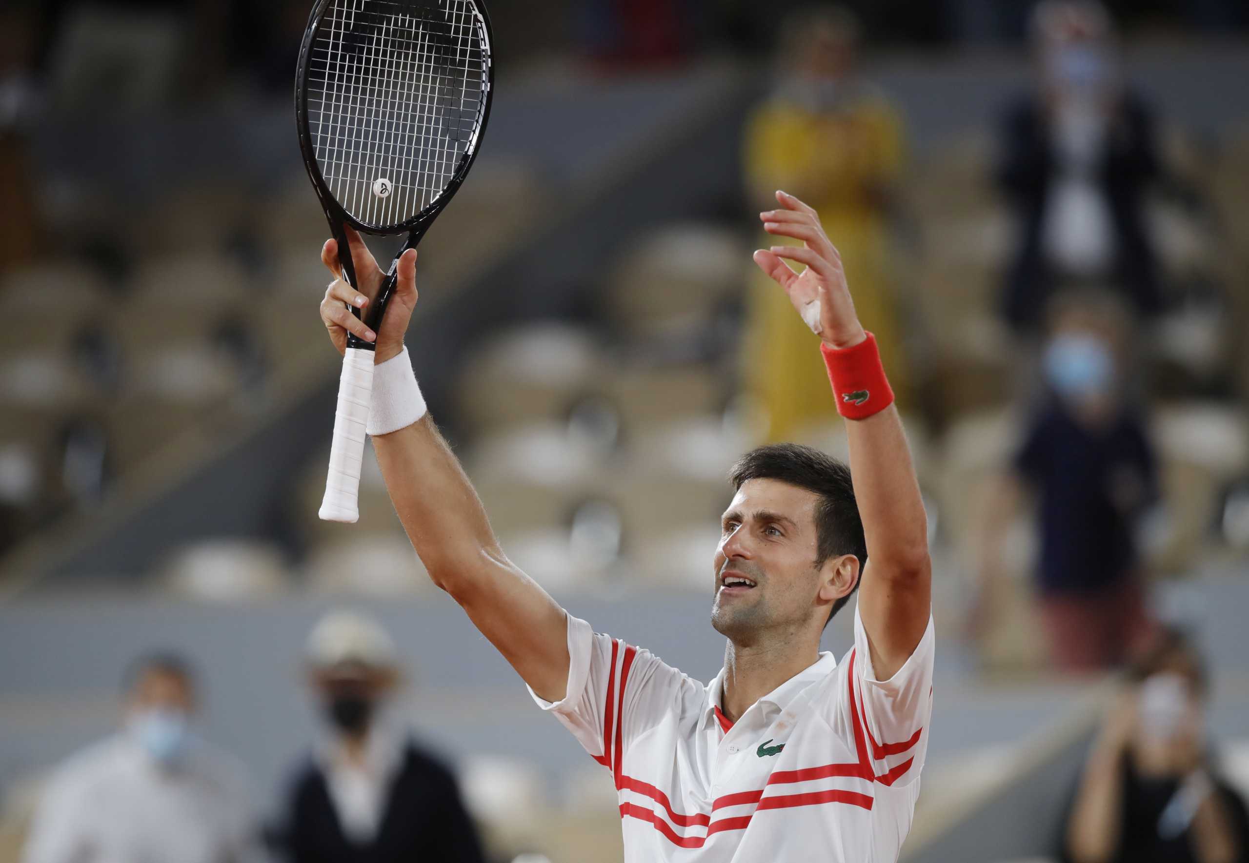 Tennis - French Open - Roland Garros, Paris, France - June 11, 2021 Serbia's Novak Djokovic celebrates winning his semi final match against Spain's Rafael Nadal REUTERS