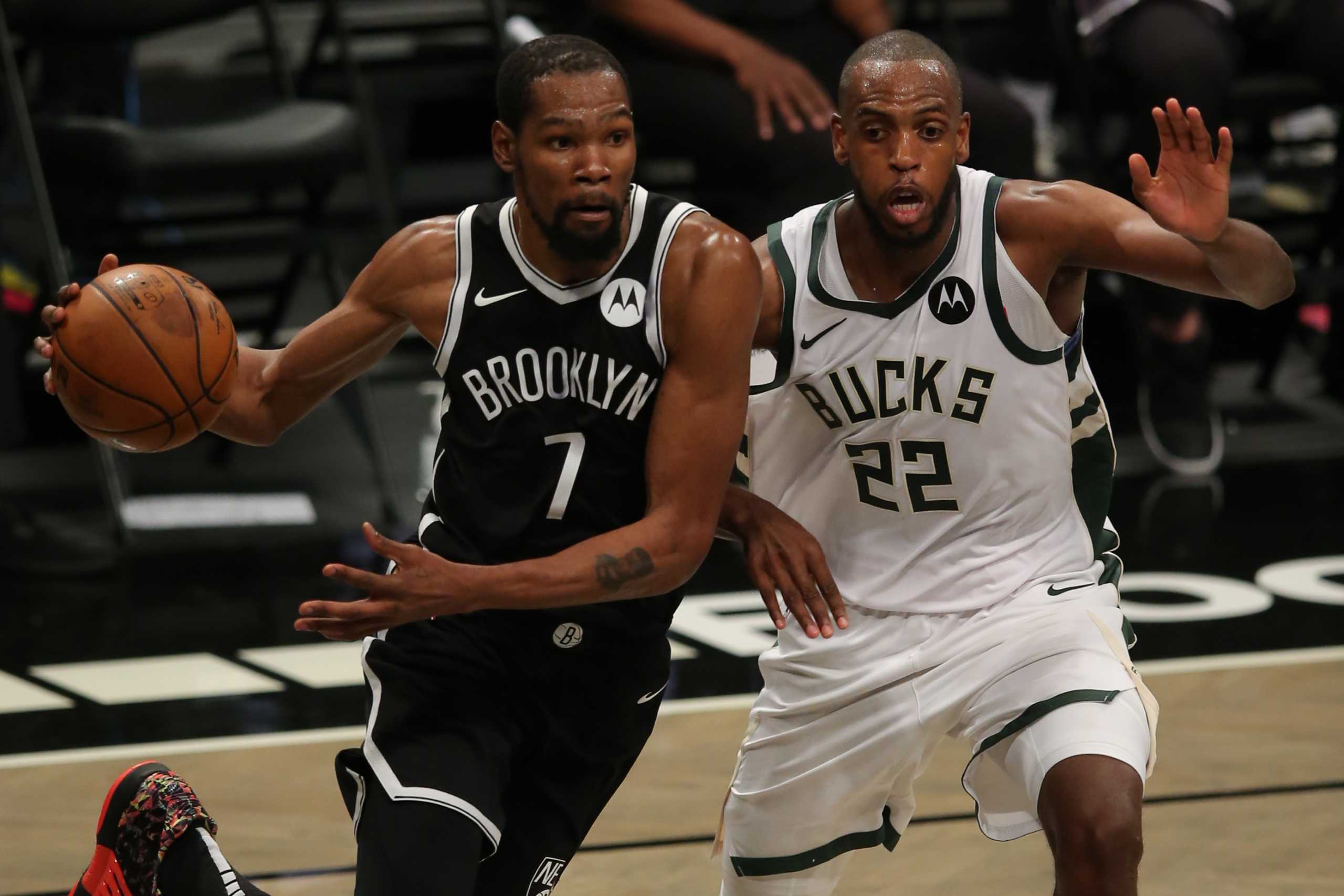 Jun 5, 2021; Brooklyn, New York, USA; Brooklyn Nets power forward Kevin Durant (7) drives to the basket against Milwaukee Bucks small forward Khris Middleton (22) during the third quarter of game one in the Eastern Conference semifinals of the 2021 NBA Playoffs at Barclays Center. Mandatory Credit: Brad Penner-USA TODAY Sports