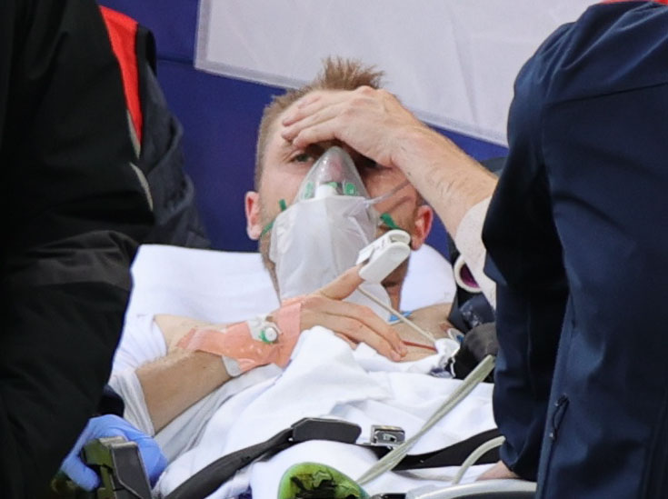 Soccer Football - Euro 2020 - Group B - Denmark v Finland - Parken Stadium, Copenhagen, Denmark - June 12, 2021 Denmark's Christian Eriksen is carried off after collapsing during the match Pool via REUTERS