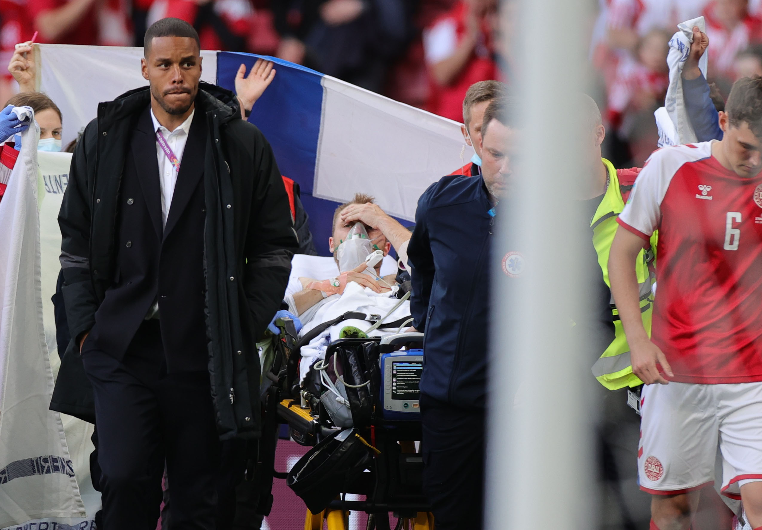 Soccer Football - Euro 2020 - Group B - Denmark v Finland - Parken Stadium, Copenhagen, Denmark - June 12, 2021 Denmark's Christian Eriksen is carried off after collapsing during the match Pool via REUTERS