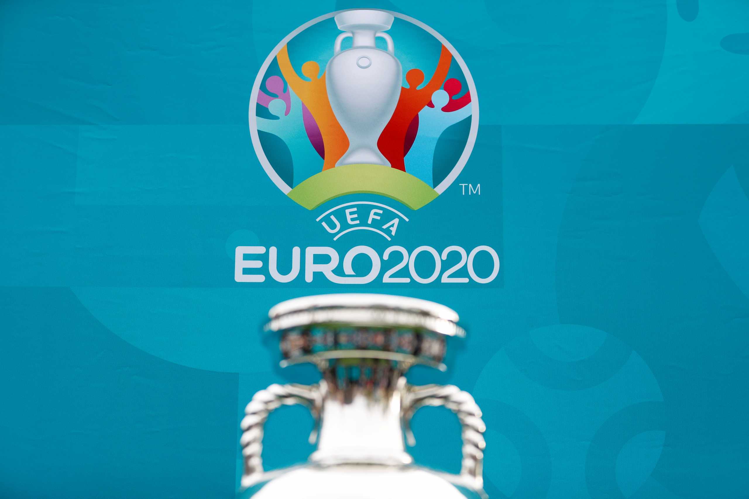 View of the tournament logo as the UEFA European Championship 2020 trophy is displayed outside King's Cross railway station in London, Britain, June 4, 2021. REUTERS