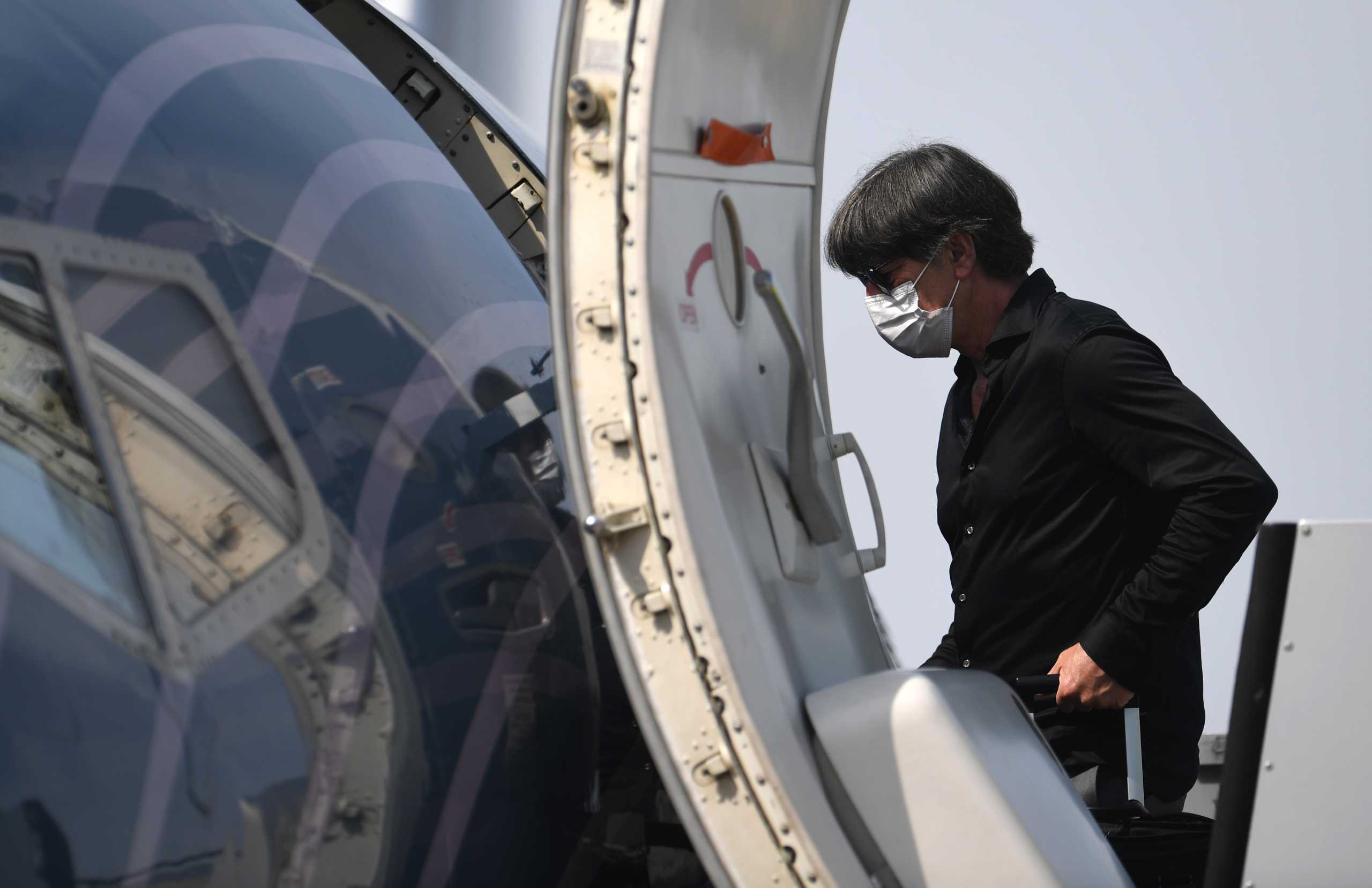 Soccer Football - Euro 2020 - Germany depart for their round of 16 match against England - Albrecht Durer Airport Nuremberg, Nuremberg, Germany - June 28, 2021 Germany coach Joachim Loew before departing for England REUTERS