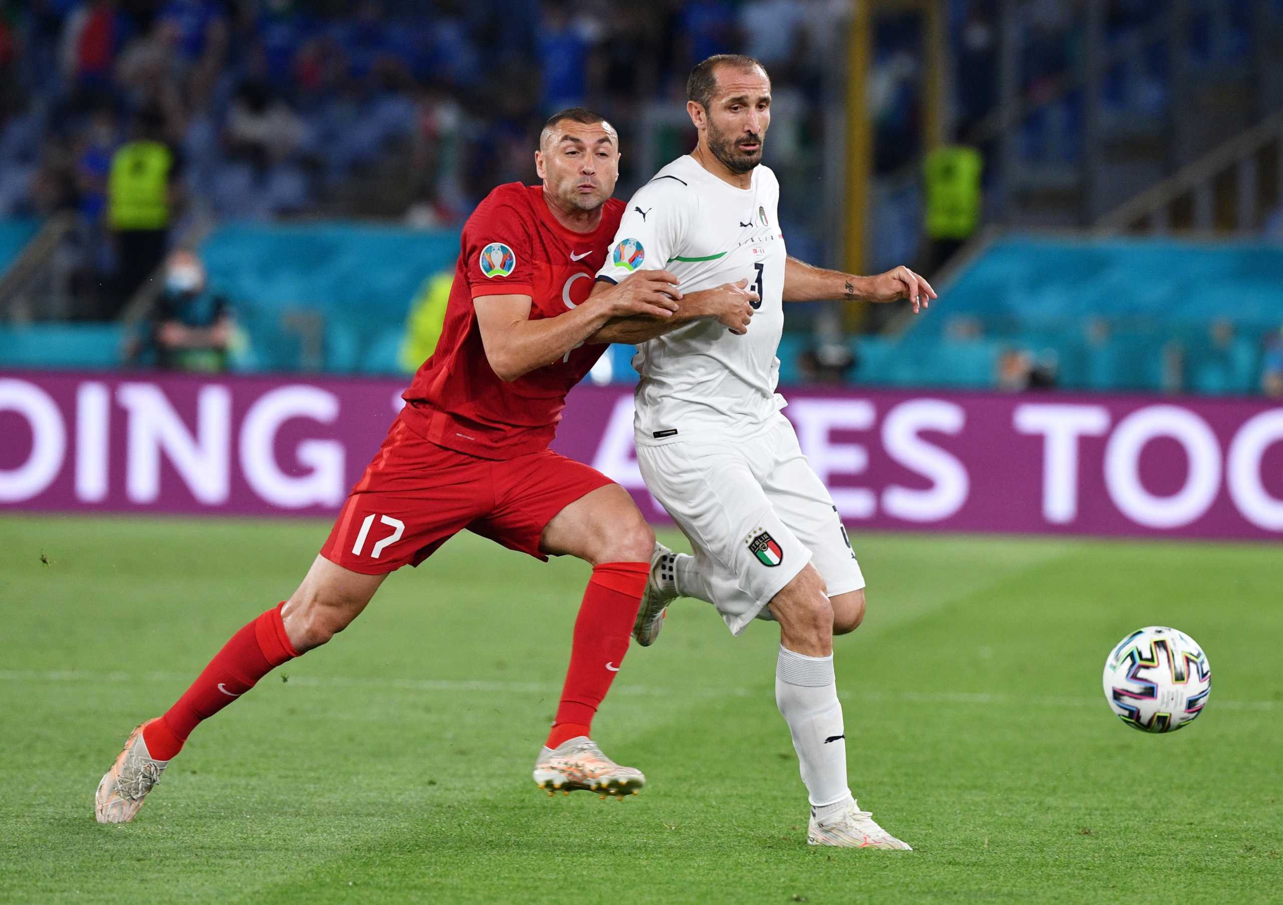 Soccer Football - Euro 2020 - Group A - Turkey v Italy - Stadio Olimpico, Rome, Italy - June 11, 2021 Turkey's Burak Yilmaz in action with Italy's Giorgio Chiellini Pool via REUTERS