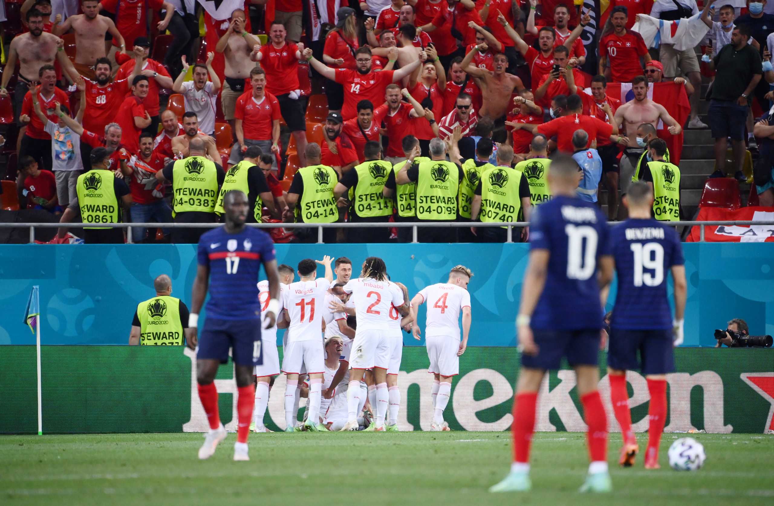 Soccer Football - Euro 2020 - Round of 16 - France v Switzerland - National Arena Bucharest, Bucharest, Romania - June 28, 2021   Switzerland's Haris Seferovic celebrates scoring their third goal with teammates Granit Xhaka and Mario Gavranovic as France's Kylian Mbappe and Karim Benzema look dejected Pool via REUTERS