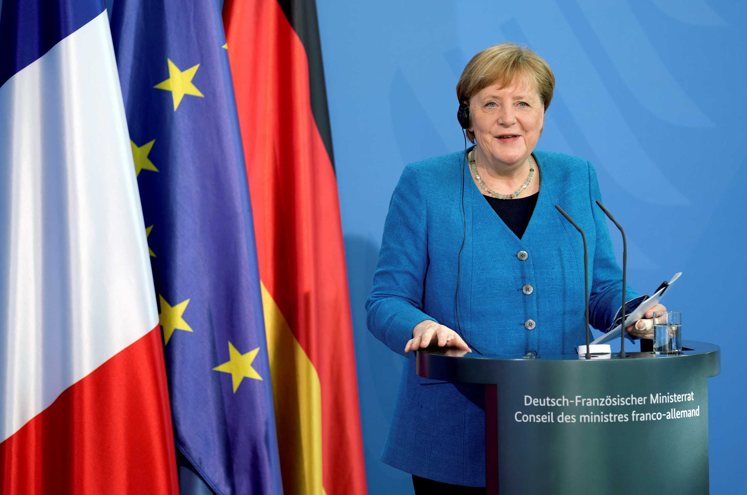 German Chancellor Angela Merkel smiles during a joint press conference with French President Emmanuel Macron as part of a virtual Plenary Session of the Franco-German Council of Ministers in Berlin, Germany, May 31, 2021. Michael Sohn