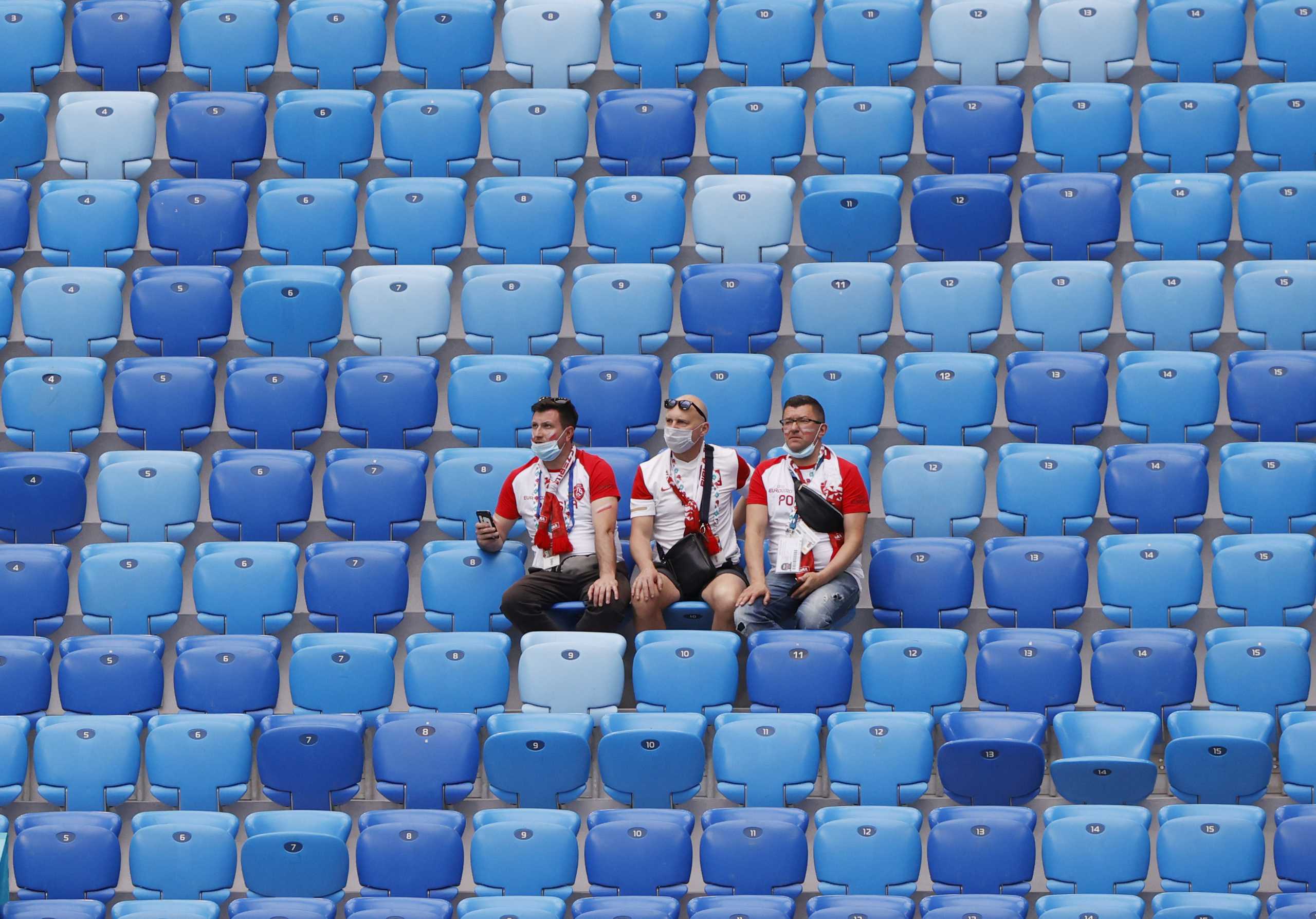 Soccer Football - Euro 2020 - Group E - Poland v Slovakia - Saint Petersburg Stadium, Saint Petersburg, Russia- June 14, 2021 Poland fans before the match Pool via REUTERS