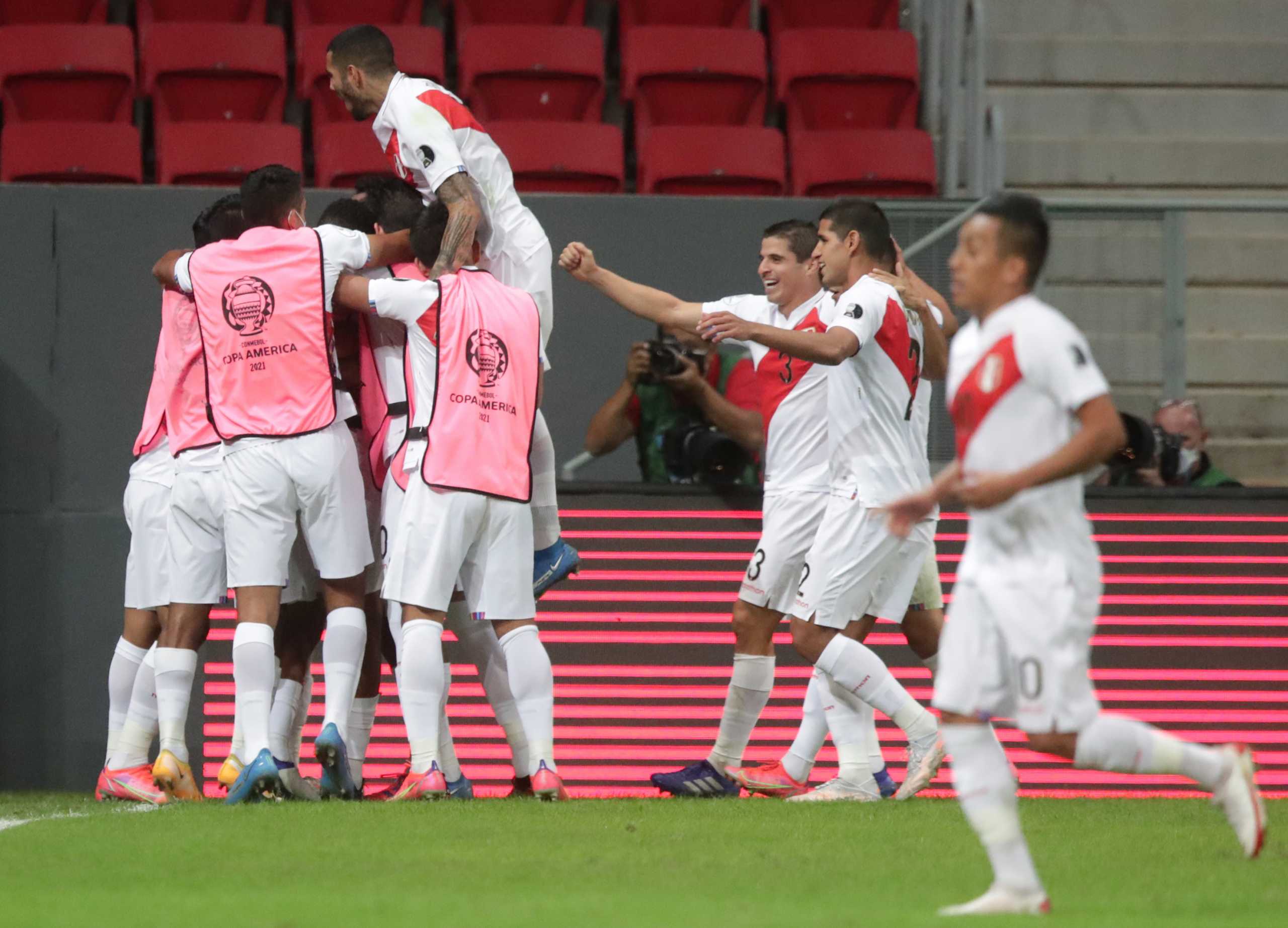 Soccer Football - Copa America 2021 - Group B - Venezuela v Peru - Estadio Mane Garrincha, Brasilia, Brazil - June 27, 2021 Peru's Andre Carrillo celebrates scoring their first goal with teammates REUTERS