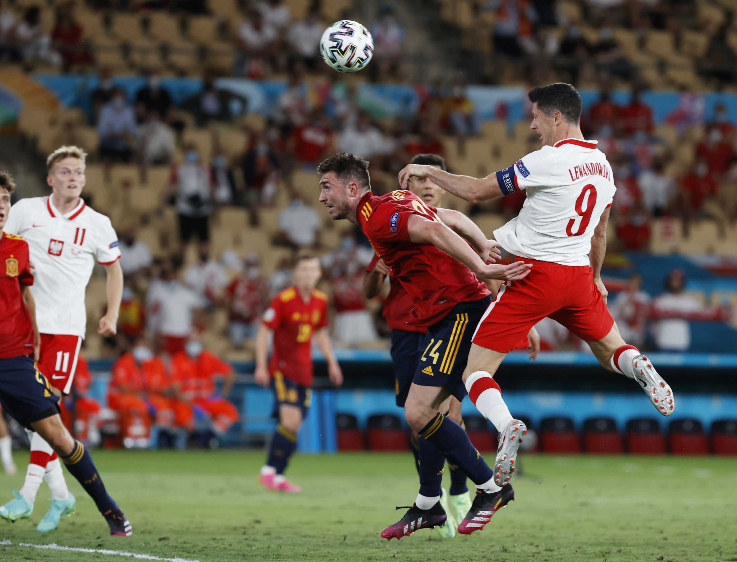 Soccer Football - Euro 2020 - Group E - Spain v Poland - La Cartuja Stadium, Seville, Spain - June 19, 2021 Poland's Robert Lewandowski scores their first goal Pool via REUTERS