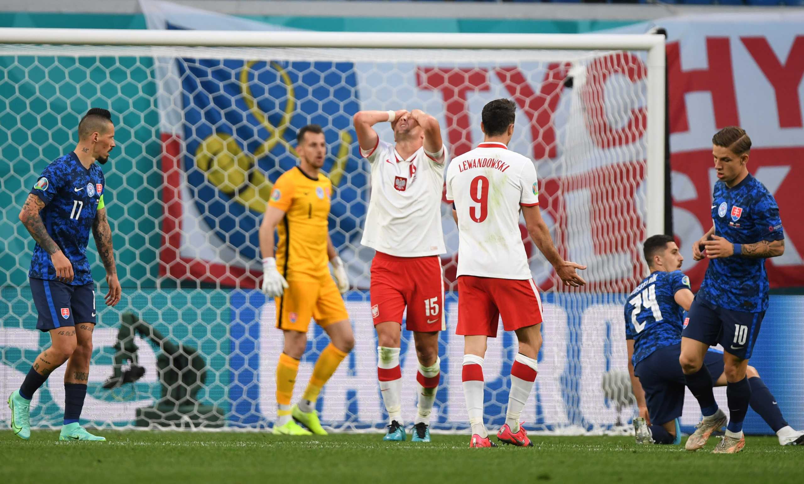 Soccer Football - Euro 2020 - Group E - Poland v Slovakia - Saint Petersburg Stadium, Saint Petersburg, Russia- June 14, 2021 Poland's Kamil Glik reacts after a missed chance Pool via REUTERS