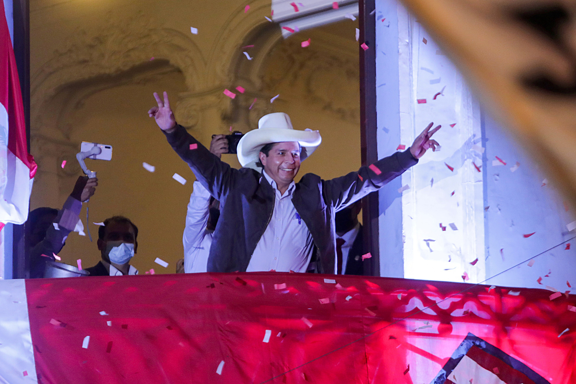 FILE PHOTO: Peru's presidential candidate Pedro Castillo addresses supporters from the headquarters of the "Free Peru" party in Lima, Peru, June 15, 2021. REUTERS