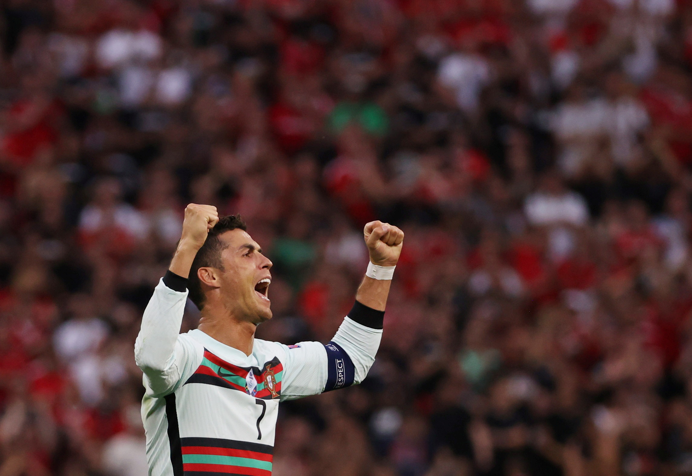Soccer Football - Euro 2020 - Group F - Hungary v Portugal - Puskas Arena, Budapest, Hungary - June 15, 2021 Portugal's Cristiano Ronaldo celebrates after the match Pool via REUTERS
