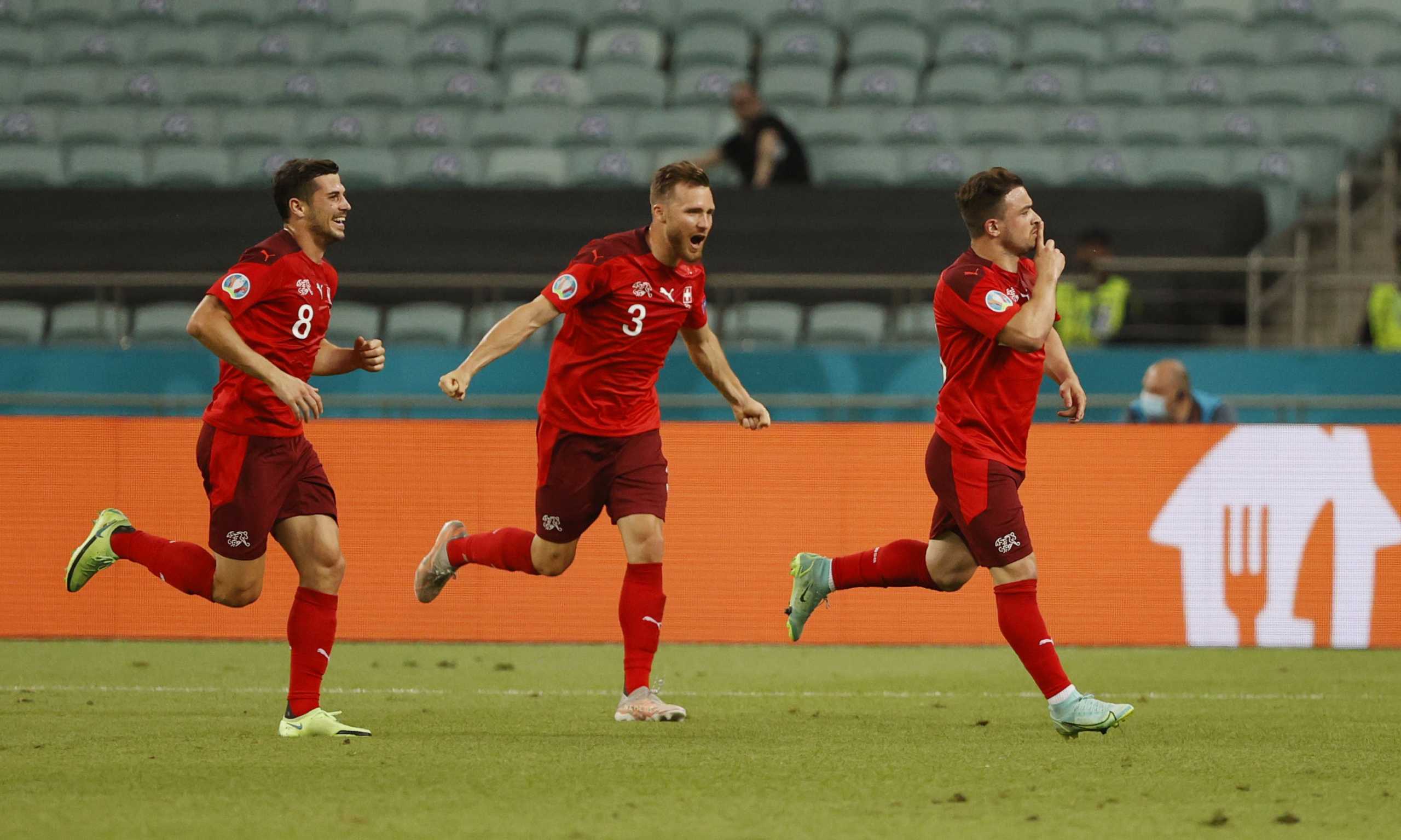 Soccer Football - Euro 2020 - Group A - Switzerland v Turkey - Baku Olympic Stadium, Baku, Azerbaijan - June 20, 2021 Switzerland's Xherdan Shaqiri celebrates scoring their second goal with Remo Freuler and Silvan Widmer Pool via REUTERS