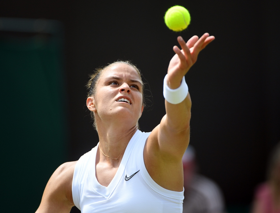 epa07696912 Maria Sakkari of Greece serves to Elina Svitolina of Ukraine in their third round match  during the Wimbledon Championships at the All England Lawn Tennis Club, in London, Britain, 05 July 2019. EPA