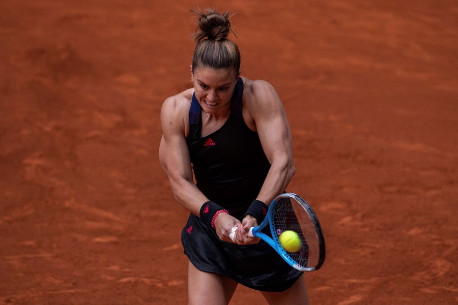 epa09173920 Maria Sakkari of Greece in action during her match against Anett Kontaveti of Estonia at the Mutua Madrid Open tennis tournament, in Madrid, Spain, 02 May 2021.  EPA