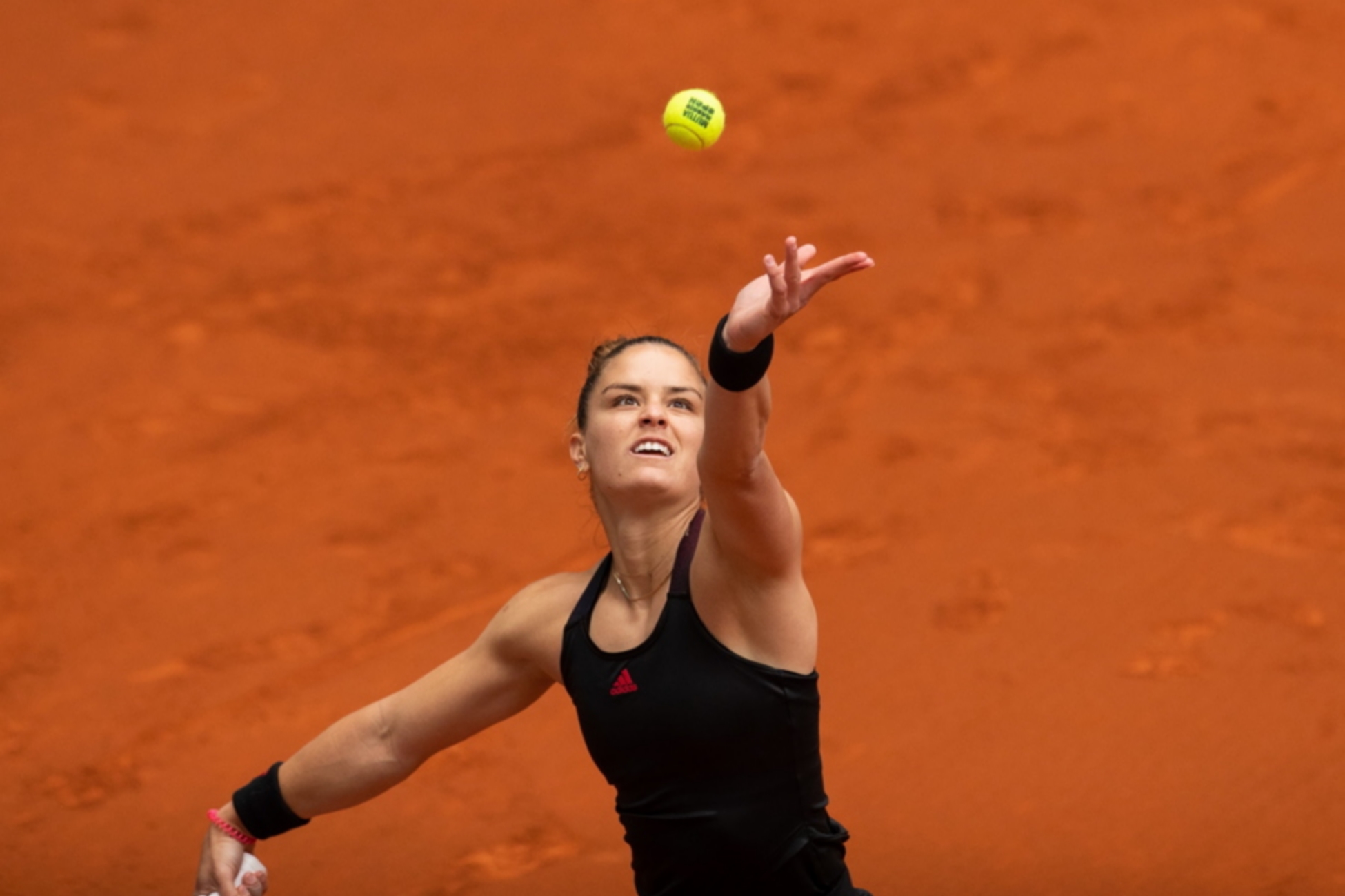 epa09169329 Greek tennis player Maria Sakkari in action against Amanda Anisimova of USA during their Mutua Madrid Open tennis match at Caja Magica court in Madrid, Spain, 30 April 2021.  EPA