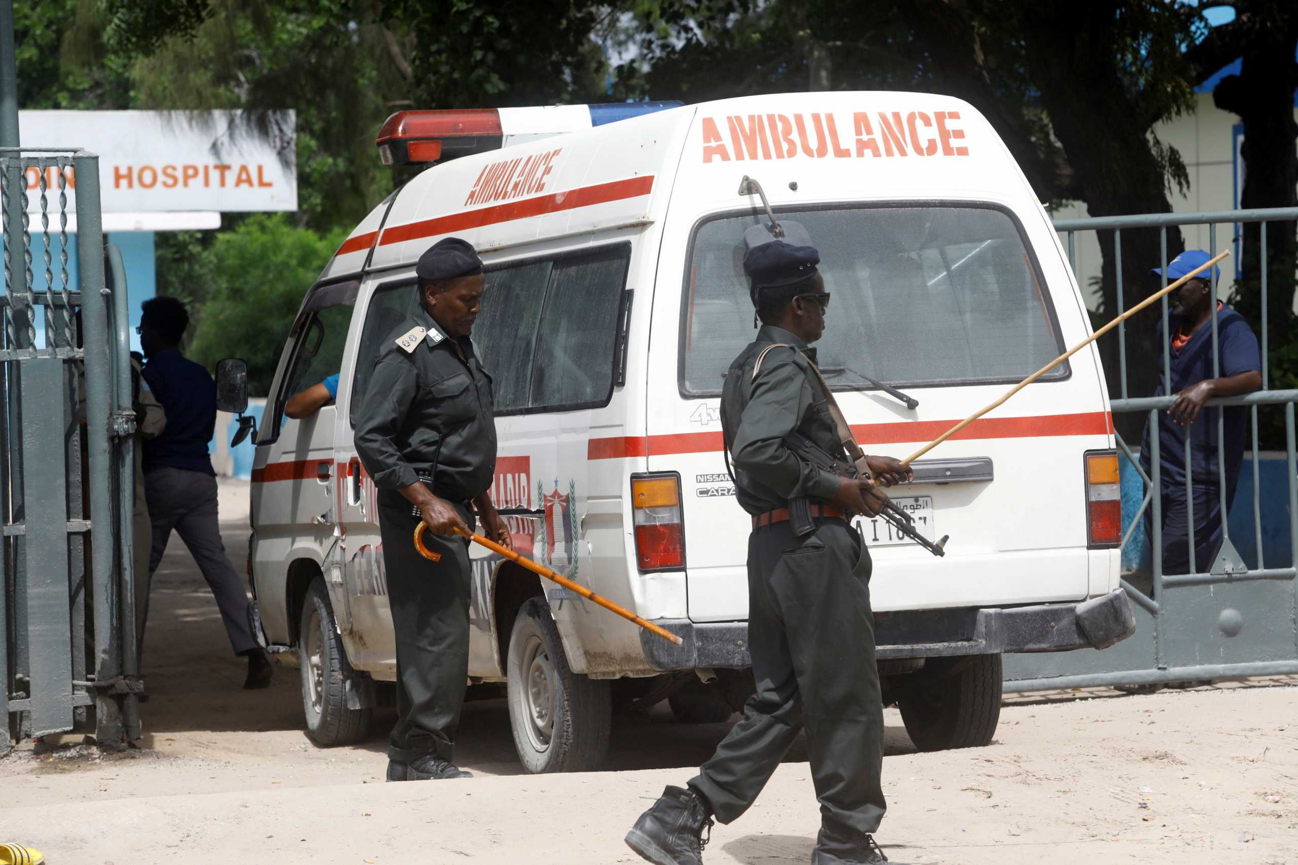 An ambulance carrying wounded from a suicide bombing attack at a military base arrives at the Madina Hospital in Mogadishu, Somalia June 15, 2021. REUTERS