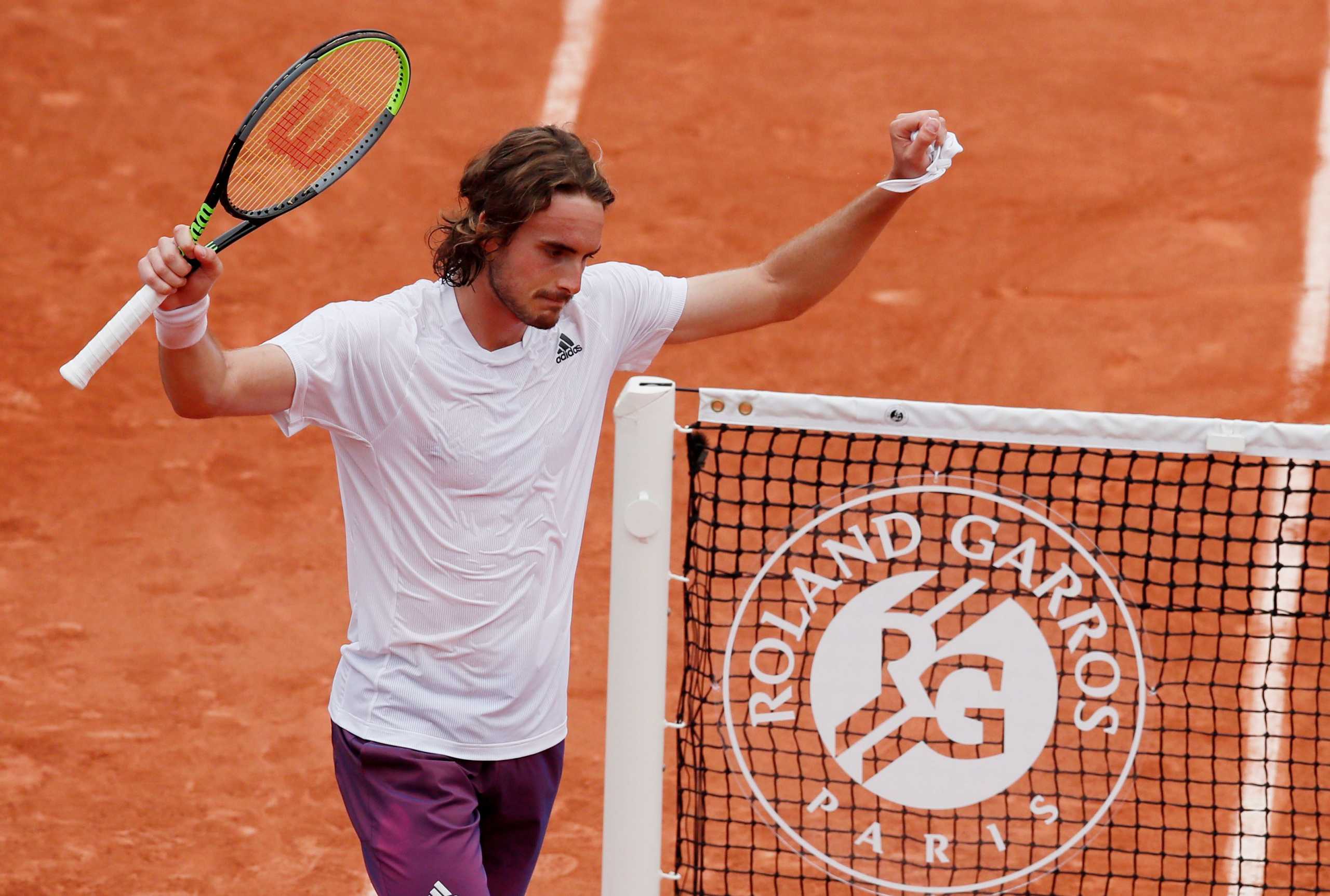 Tennis - French Open - Roland Garros, Paris, France - June 2, 2021 Greece's Stefanos Tsitsipas celebrates winning his second round match against Spain's Pedro Martínez REUTERS