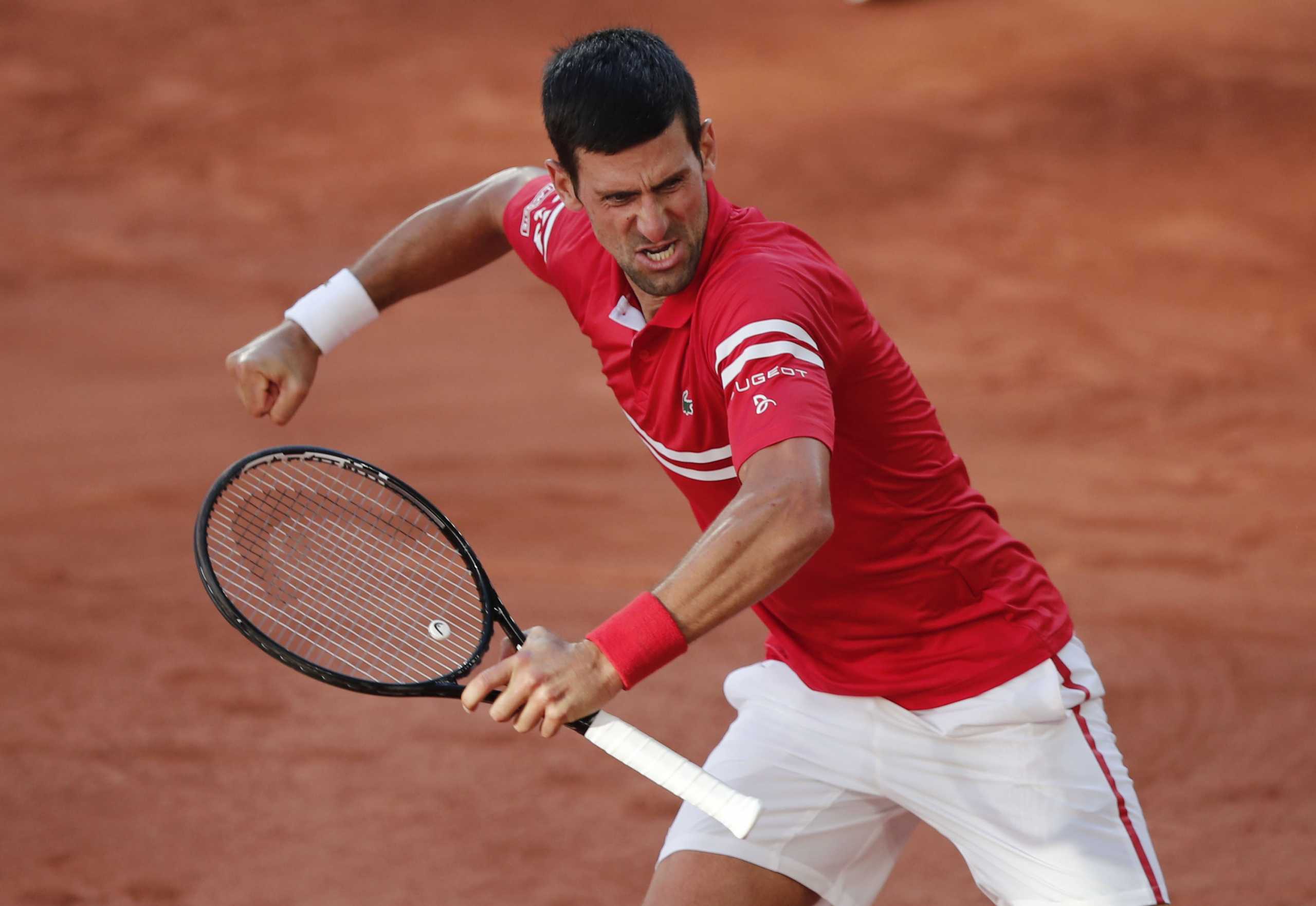 Tennis - French Open - Roland Garros, Paris, France - June 13, 2021 Serbia's Novak Djokovic celebrates winning the final against Greece's Stefanos Tsitsipas REUTERS