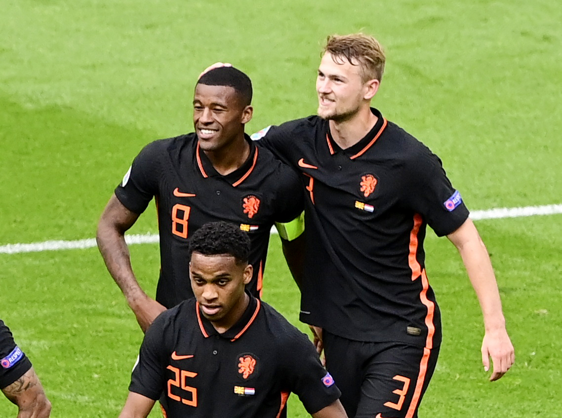 Soccer Football - Euro 2020 - Group C - North Macedonia v Netherlands - Johan Cruijff ArenA, Amsterdam, Netherlands - June 21, 2021 Netherlands' Georginio Wijnaldum celebrates scoring their third goal with Matthijs de Ligt Pool via REUTERS