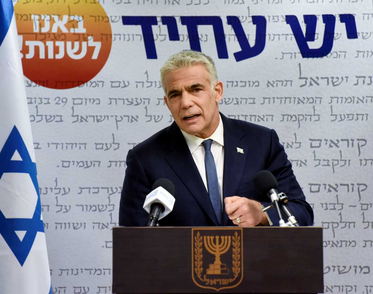 Yair Lapid, head of the centrist Yesh Atid party, delivers a statement to the press before the party faction meeting at the Knesset, Israel's parliament, in Jerusalem May 31, 2021. Debbie Hill