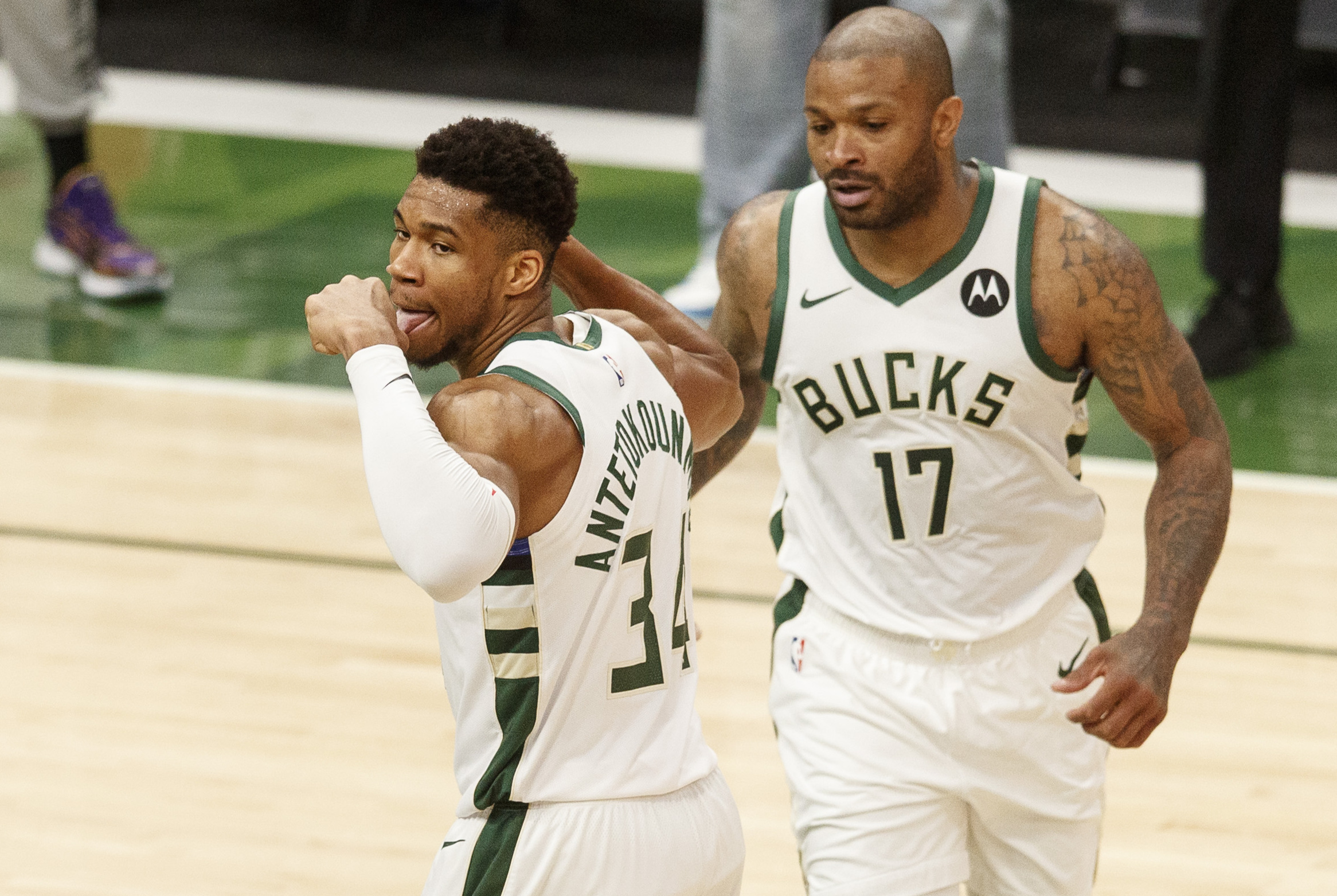 Jun 13, 2021; Milwaukee, Wisconsin, USA;  Milwaukee Bucks forward Giannis Antetokounmpo (34) reacts following a basket during the third quarter against the Brooklyn Nets during game four in the second round of the 2021 NBA Playoffs. at Fiserv Forum. Mandatory Credit: Jeff Hanisch-USA TODAY Sports