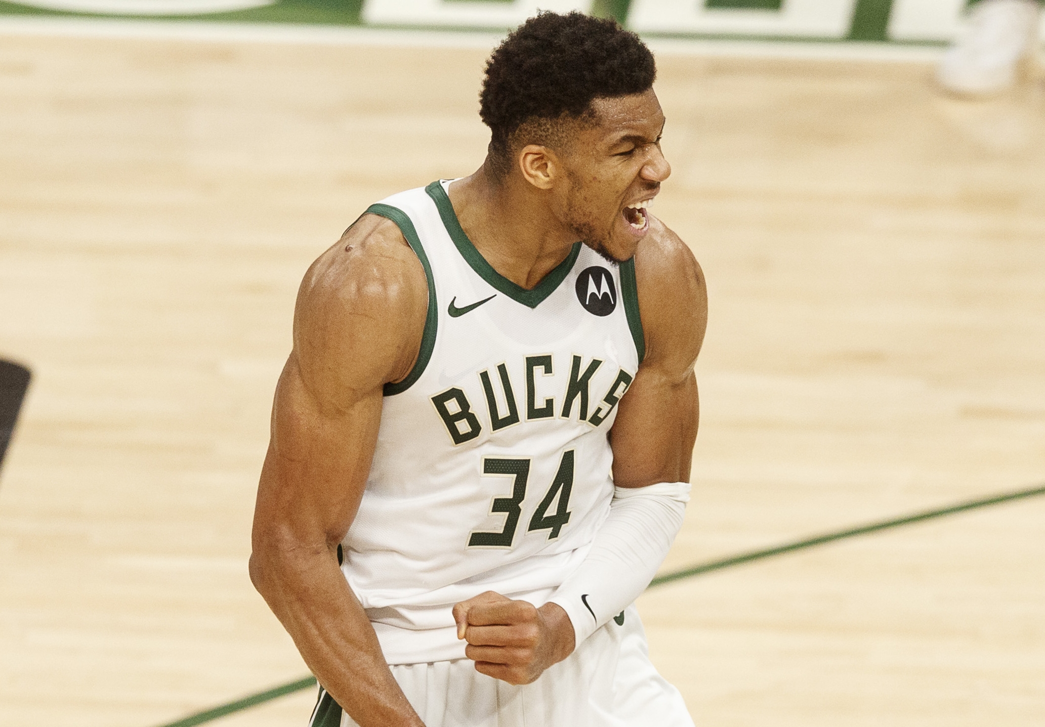 Jun 13, 2021; Milwaukee, Wisconsin, USA;  Milwaukee Bucks forward Giannis Antetokounmpo (34) reacts following a basket zduring the fourth quarter against the Brooklyn Nets during game four in the second round of the 2021 NBA Playoffs. at Fiserv Forum. Mandatory Credit: Jeff Hanisch-USA TODAY Sports