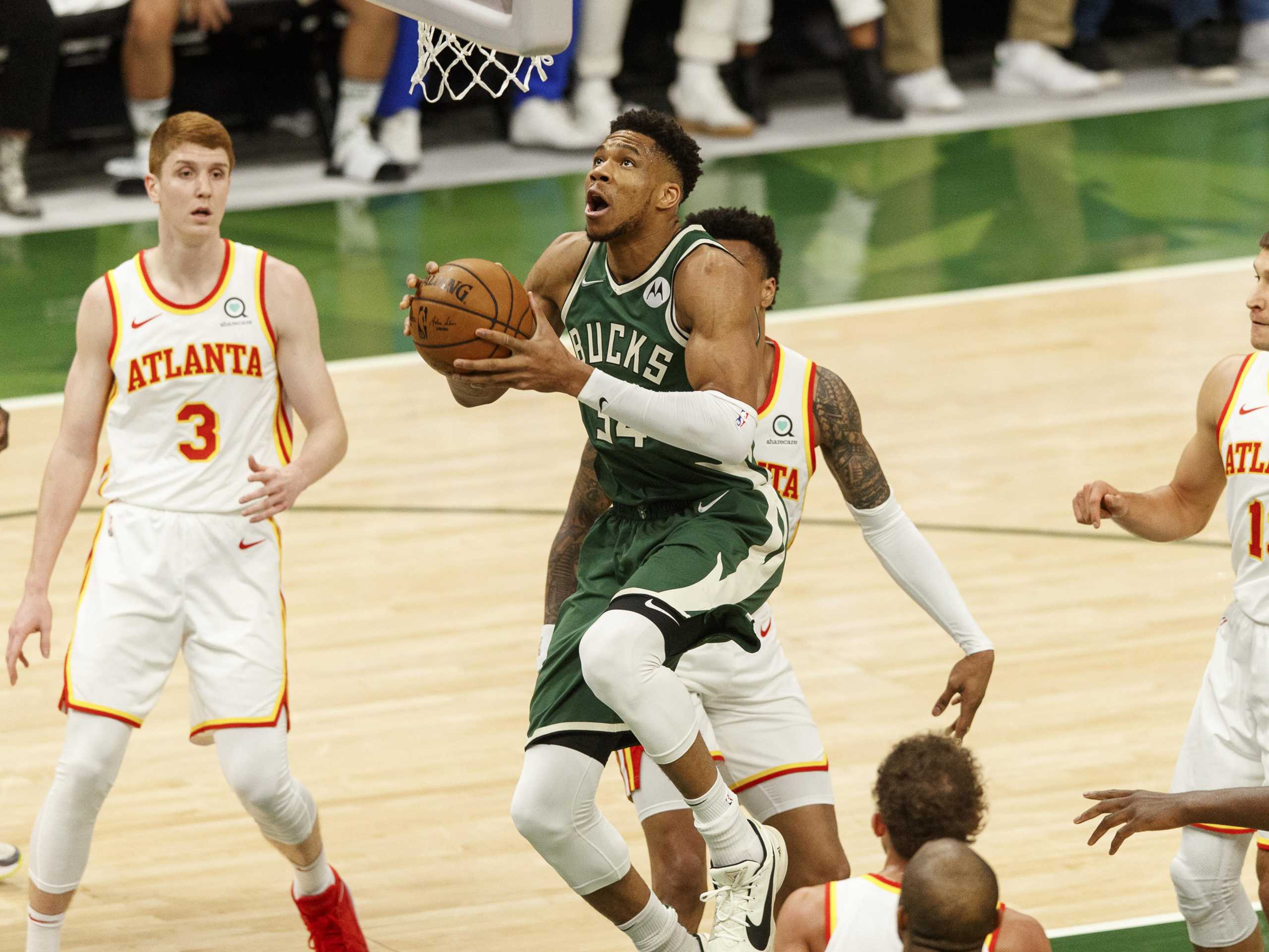 Jun 23, 2021; Milwaukee, Wisconsin, USA;  Milwaukee Bucks forward Giannis Antetokounmpo (34) shoots during the first quarter against the Atlanta Hawks during game one of the Eastern Conference Finals for the 2021 NBA Playoffs at Fiserv Forum. Mandatory Credit: Jeff Hanisch-USA TODAY Sports
