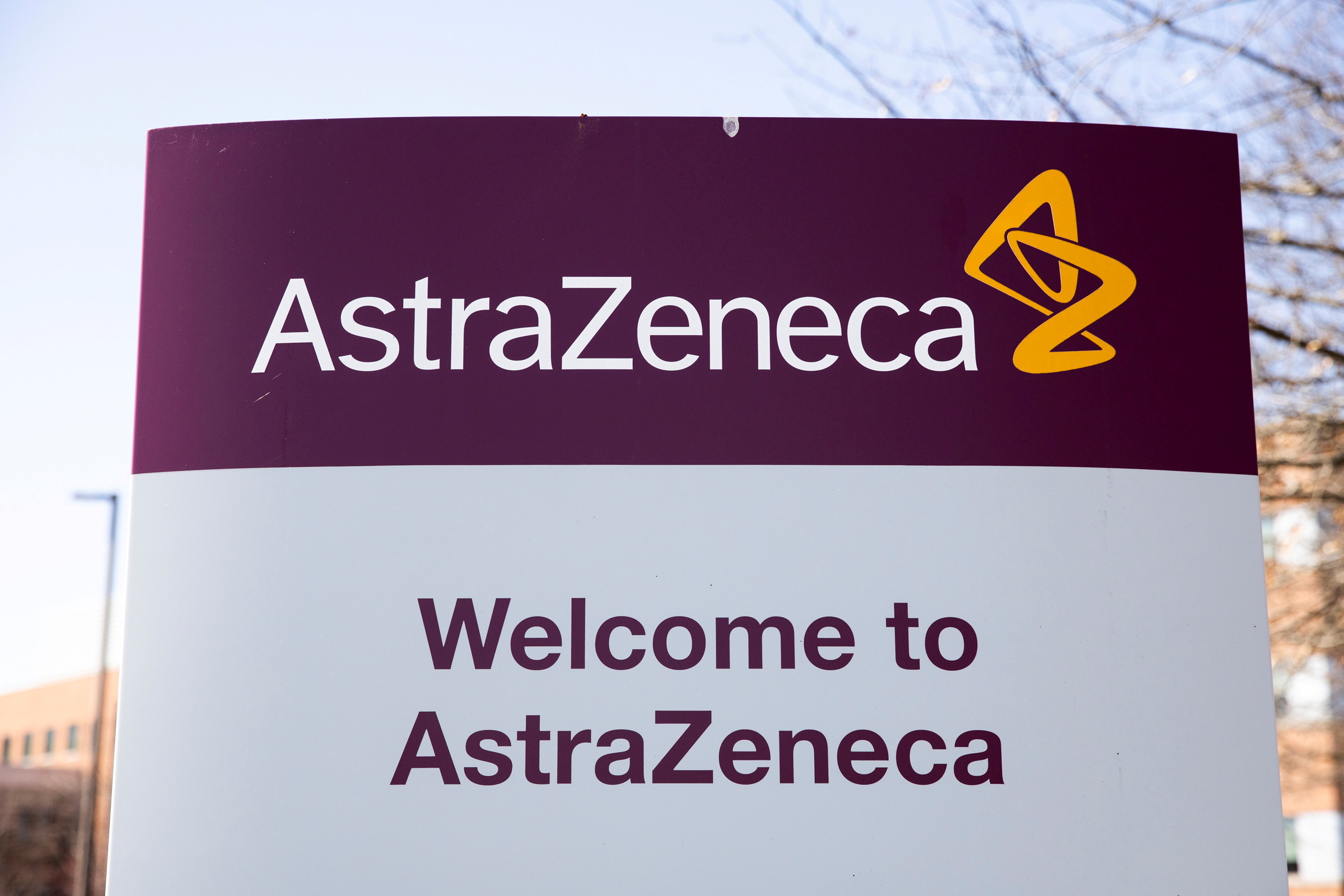 FILE PHOTO: The logo for AstraZeneca is seen outside its North America headquarters in Wilmington, Delaware, U.S., March 22, 2021.  REUTERS