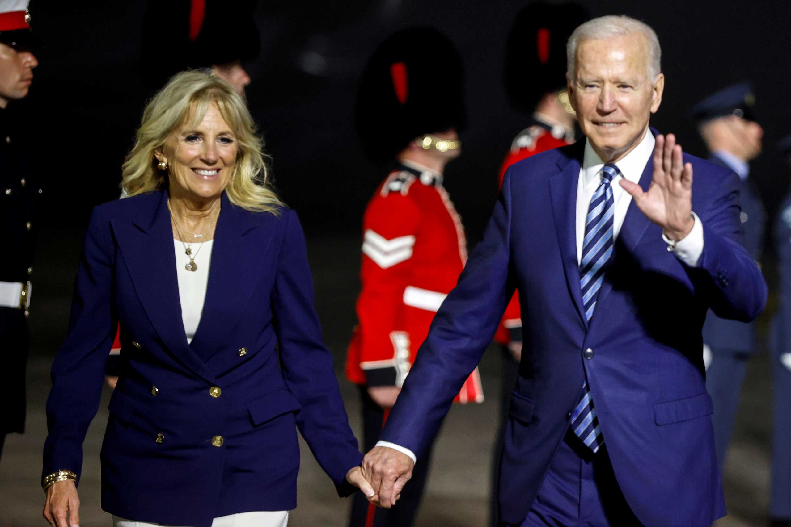 U.S. President Joe Biden and first lady Jill Biden react upon arrival at Cornwall Airport Newquay, near Newquay, Cornwall, Britain June 9, 2021. REUTERS