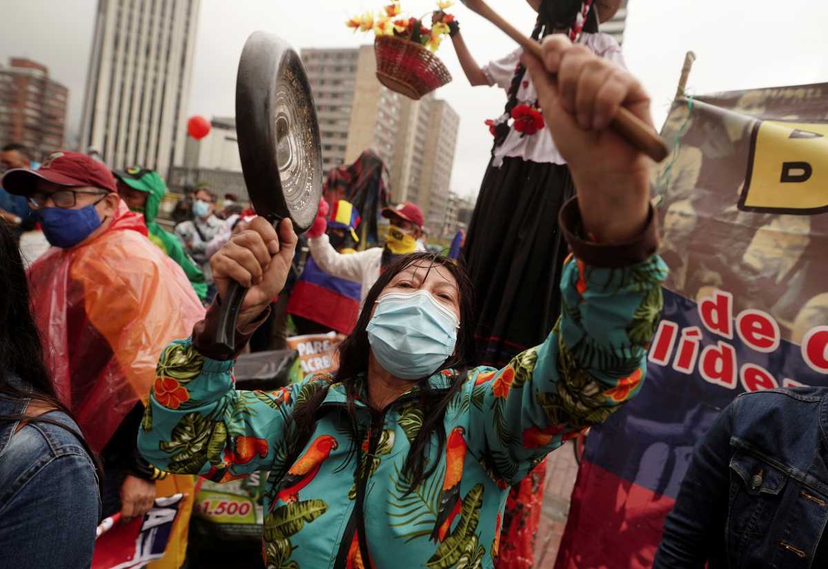 Demonstrators gather outside a local hotel where representatives of the Inter-American Commission on Human Rights (CIDH) and union leaders meet, in Bogota, Colombia June 9, 2021. REUTERS