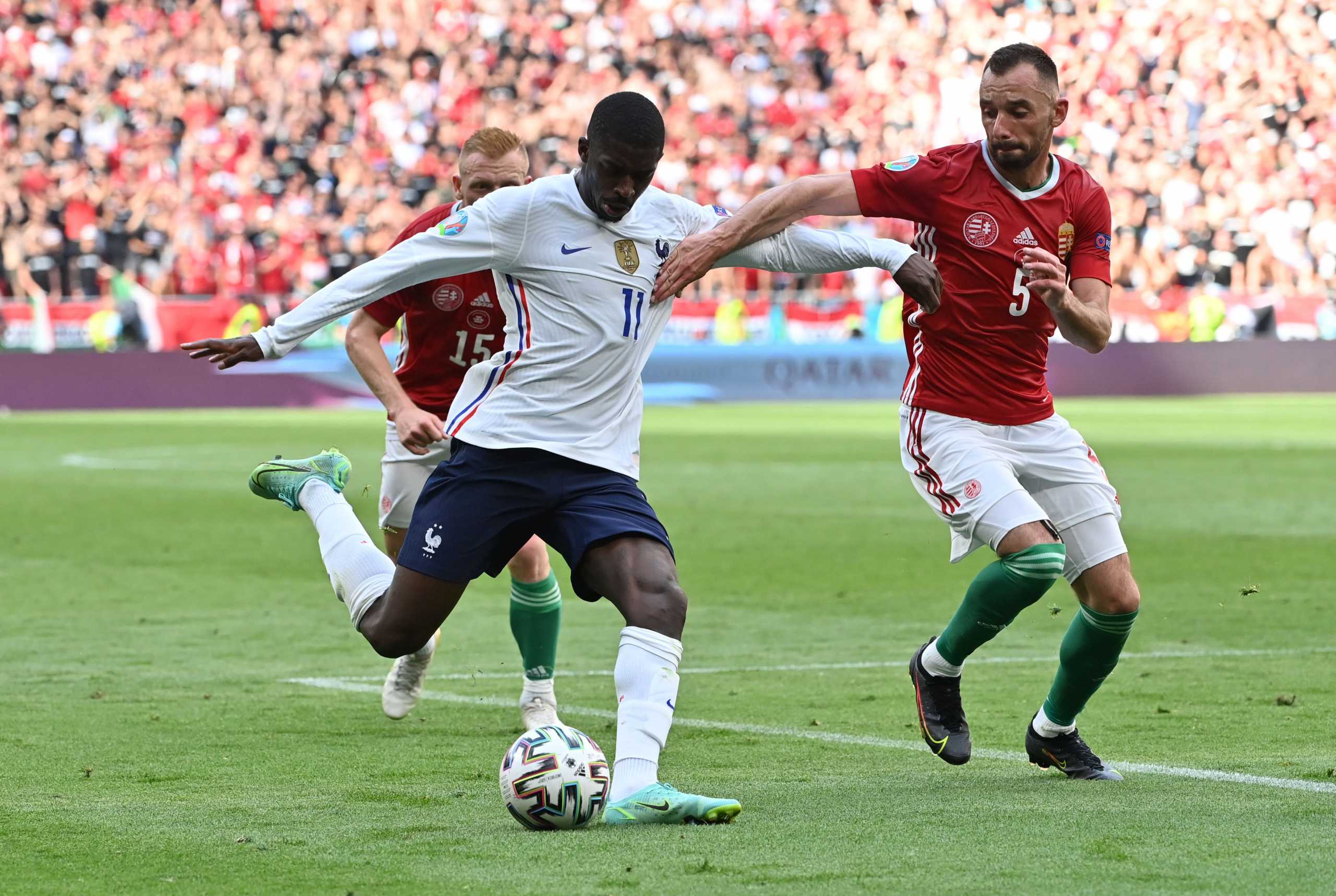 Soccer Football - Euro 2020 - Group F - Hungary v France - Puskas Arena, Budapest, Hungary - June 19, 2021 France's Ousmane Dembele in action with Hungary's Attila Fiola Pool via REUTERS