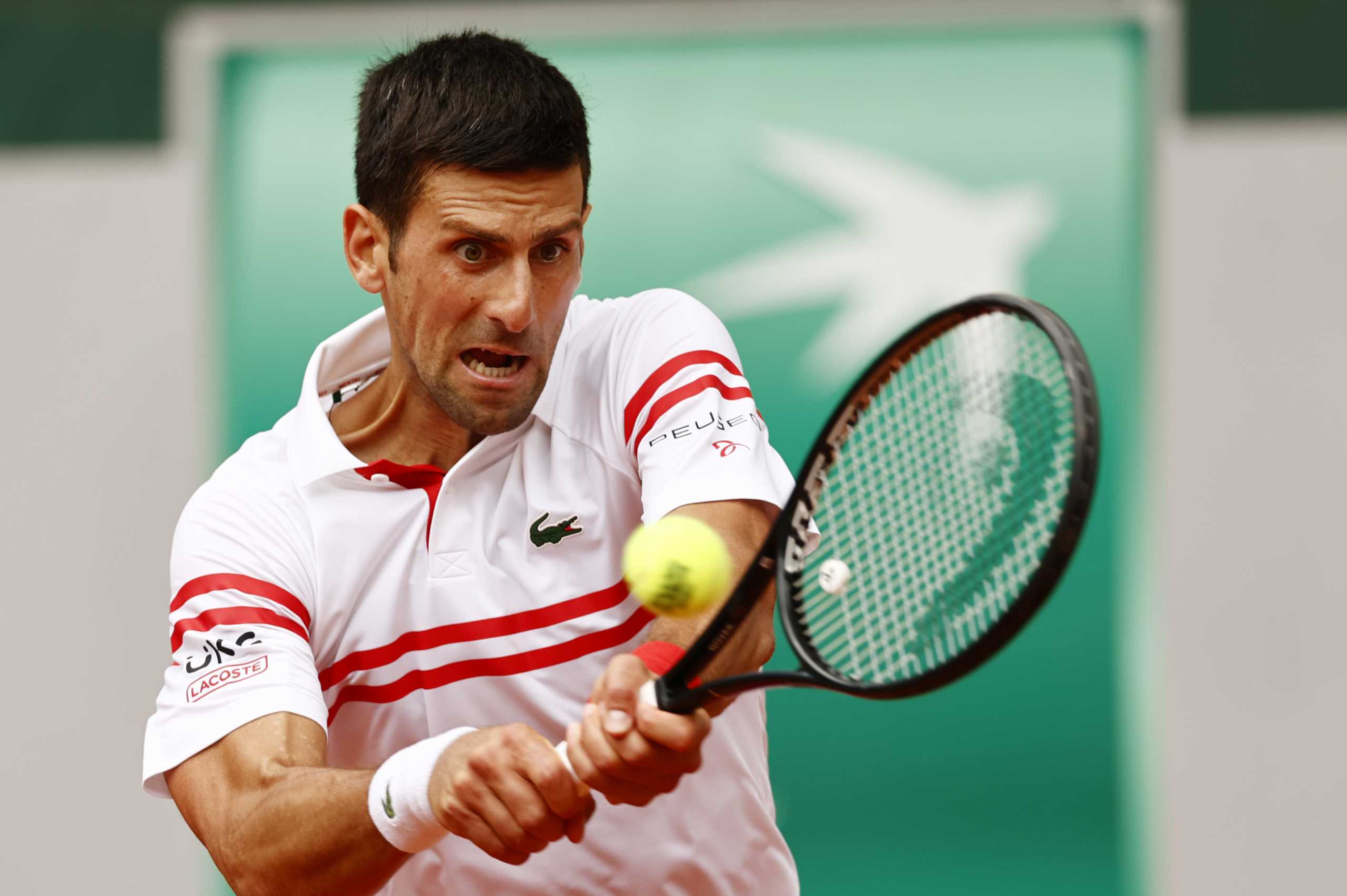 Tennis - French Open - Roland Garros, Paris, France - June 7, 2021 Serbia's Novak Djokovic in action during his fourth round match against Italy's Lorenzo Musetti REUTERS