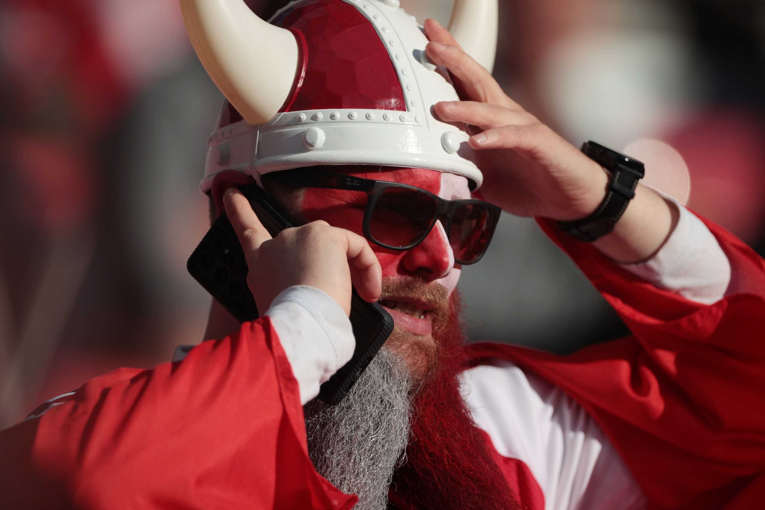 Soccer Football - Euro 2020 - Group B - Denmark v Finland - Parken Stadium, Copenhagen, Denmark - June 12, 2021 The game is postponed as a Denmark fan reacts after Christian Eriksen is carried off after collapsing during the match Pool via REUTERS
