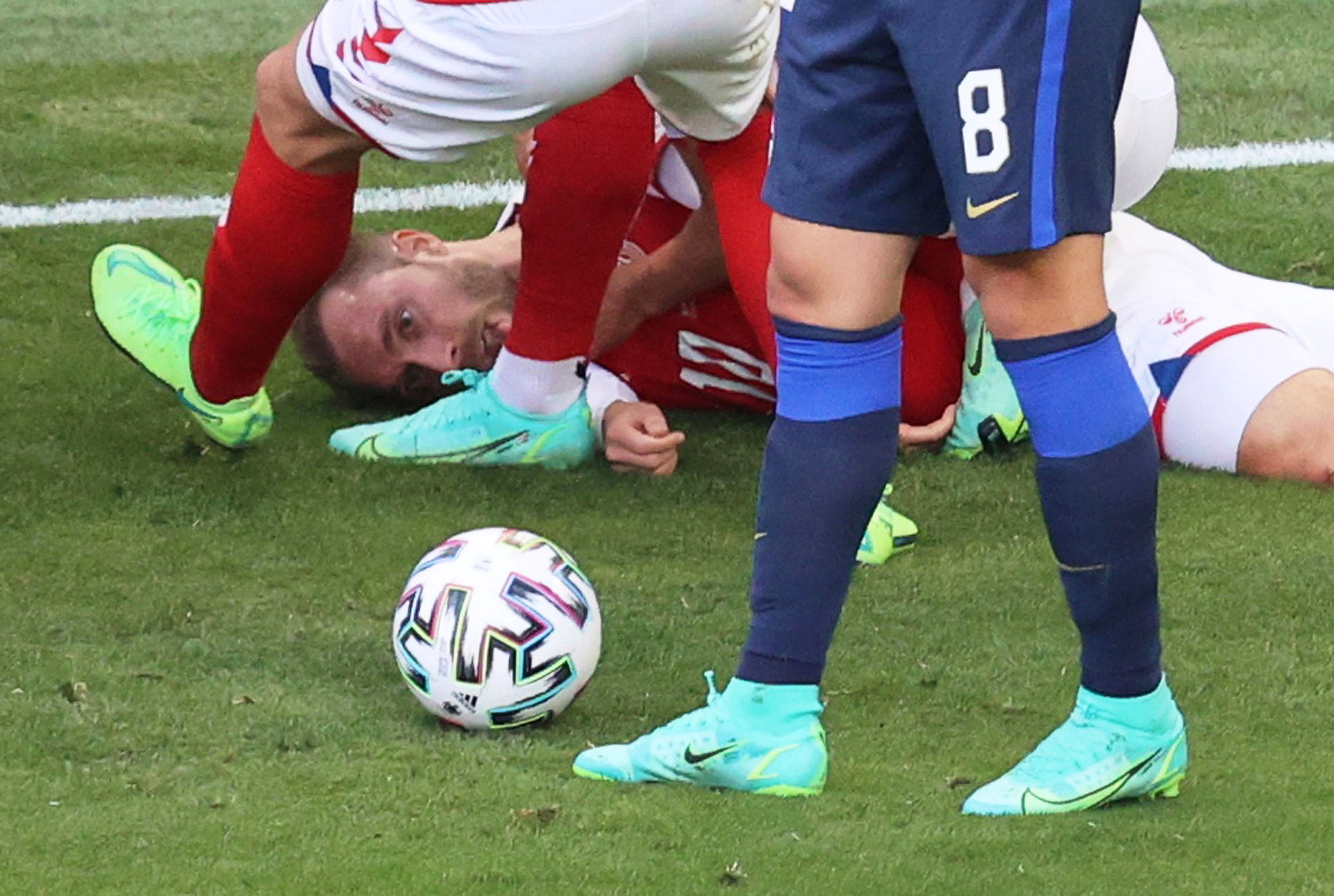 Soccer Football - Euro 2020 - Group B - Denmark v Finland - Parken Stadium, Copenhagen, Denmark - June 12, 2021 Denmark's Christian Eriksen is seen down on the pitch after collapsing during the match Pool via REUTERS